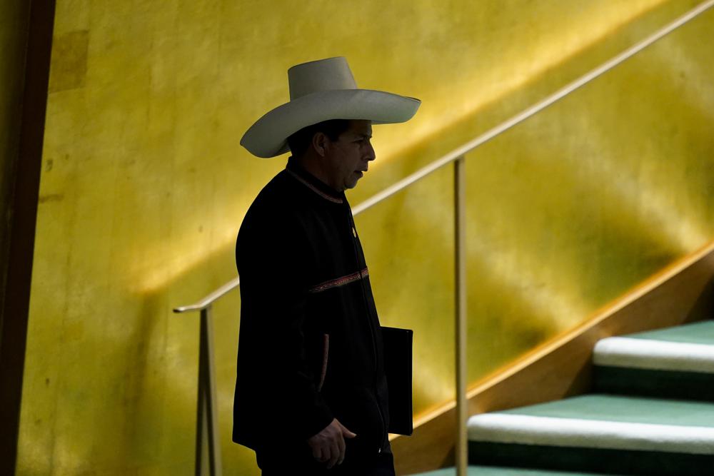 FILE - In this Sept. 21, 2021 file photo, Peruvian President Pedro Castillo Terrones arrives in the General Assembly hall to address the 76th Session of the United Nations General Assembly at U.N. headquarters. Castillo's Peru Libre party announced on Oct. 14, 2021 it will not support Castillo's new cabinet. (AP Photo/Mary Altaffer, Pool, File)