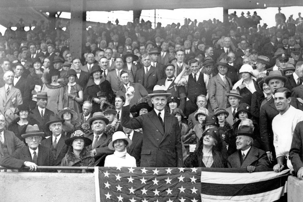 FILE - In this Oct. 4, 1924, file photo, President Calvin Coolidge throws out the ball for the opening game of the 1924 World Series between the Washington Senators and the New York Giants in Washington. (AP Photo/File)