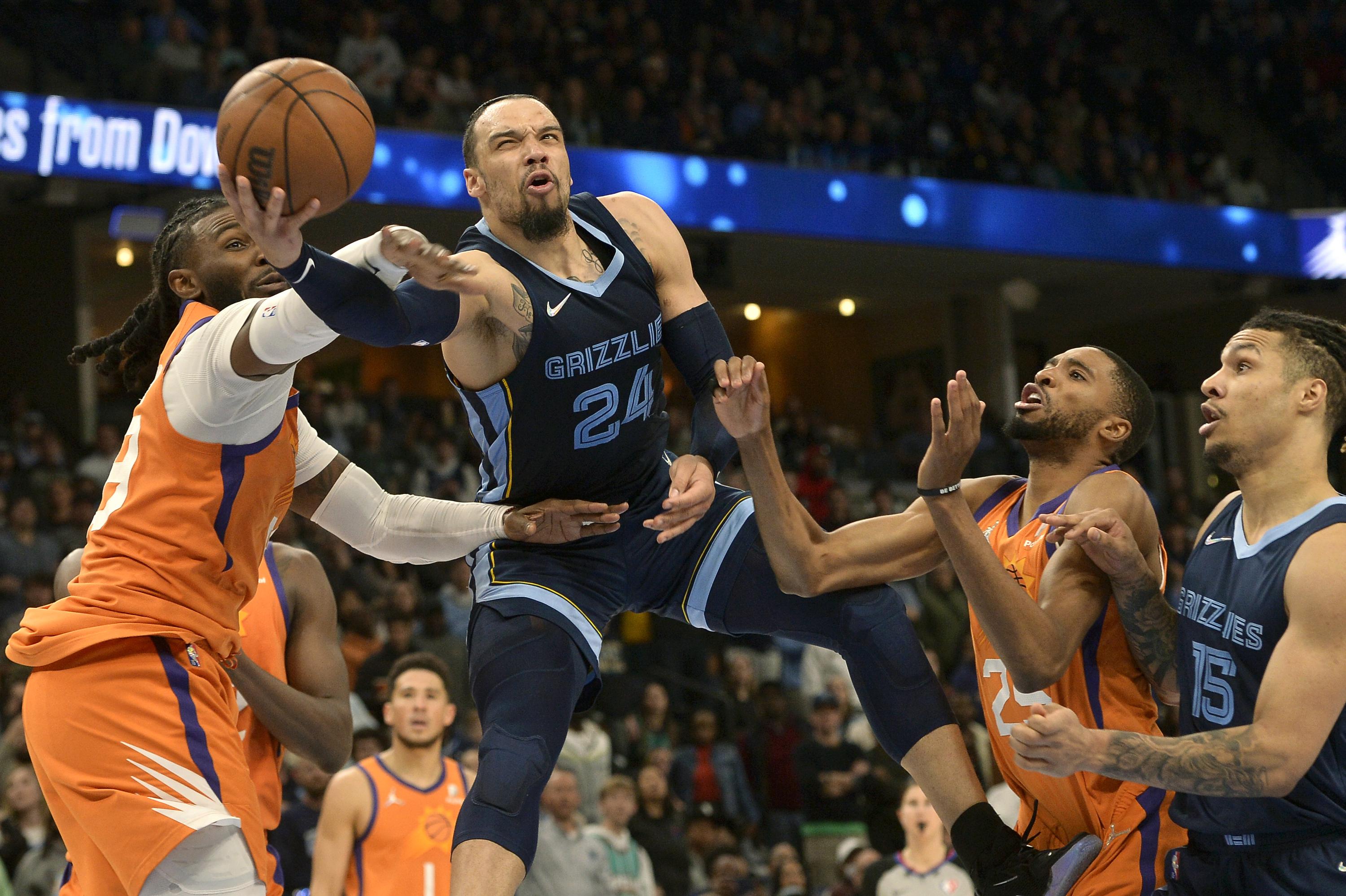 Brooks leads shorthanded Grizzlies past Suns, 122114 AP News