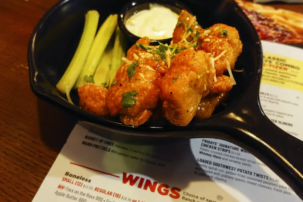 An order of "boneless chicken wings" is shown at a restaurant in Willow Grove, Pa., Wednesday, Feb. 8, 2023. With the Super Bowl at hand, behold the cheerful untruth that has been perpetrated upon (and generally with the blessing of) the chicken-consuming citizens of the United States on menus across the land: a “boneless wing” that isn’t a wing at all. (AP Photo/Matt Rourke)