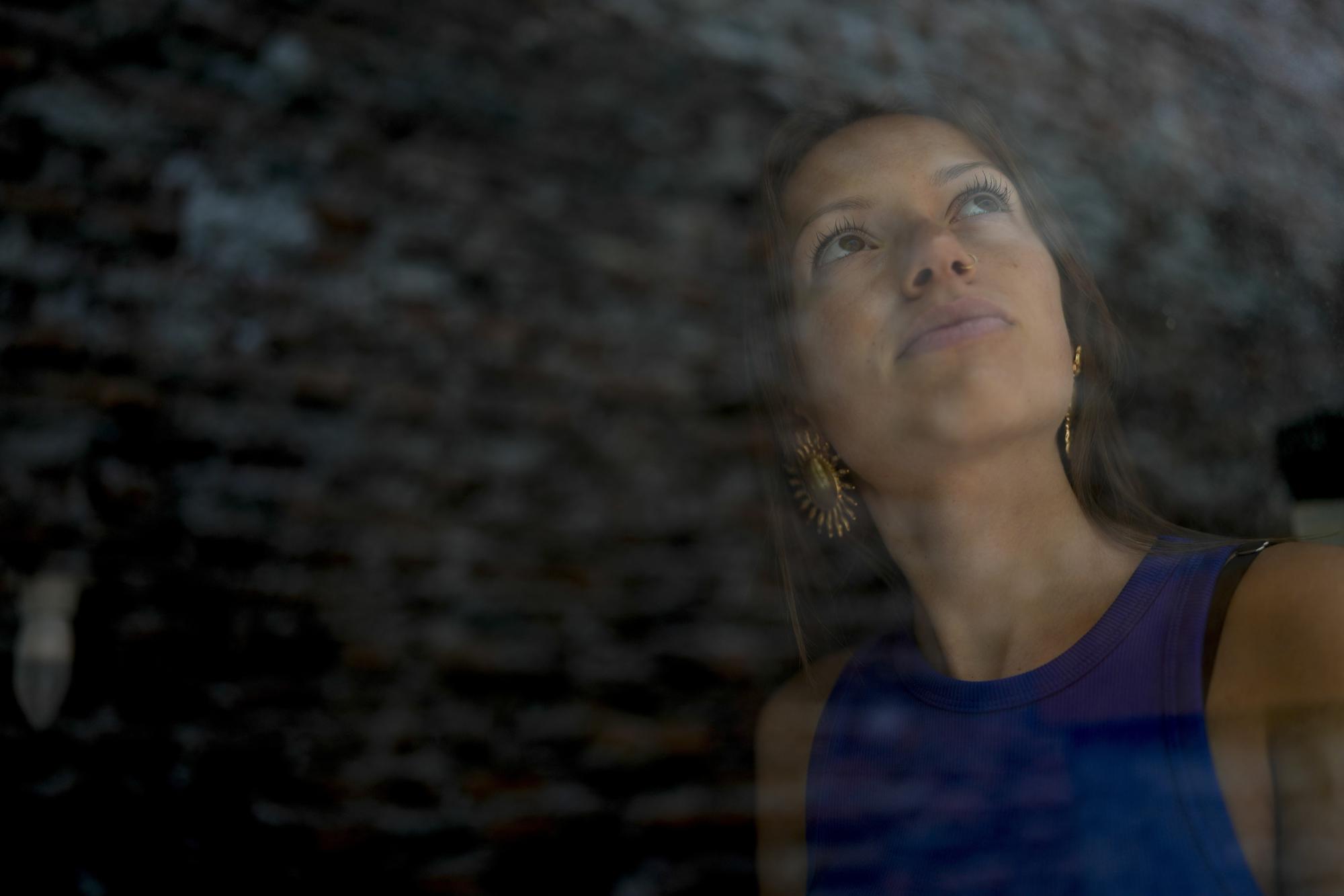 Nicki Becker poses for a photo at her house in Buenos Aires, Argentina, Tuesday, April 18, 2023. Becker is a climate activist from Argentina and one of the founders of Jóvenes por el Clima, part of the Fridays for Future movement. (AP Photo/Natacha Pisarenko)