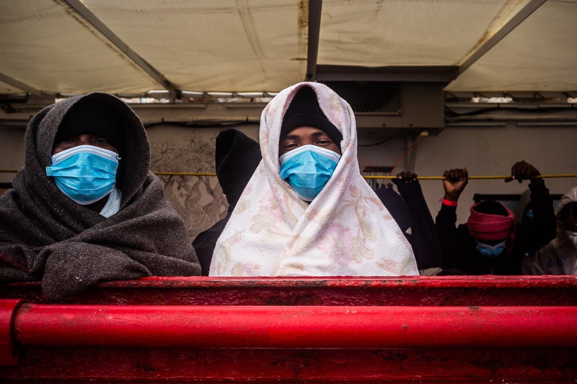 Boat with 422 migrants, some with COVID-19, goes to Sicily