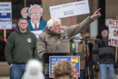 U.S. Sen. Bernie Sanders, I-Vt., speaks at a rally with striking Kellogg workers at Festival Market Square in downtown Battle Creek, Mich., on Friday, Dec. 17, 2021. Kellogg's reached a new tentative agreement this week with its 1,400 striking cereal plant workers that could bring an end to the strike that began Oct. 5. The results of the contract vote are expected to be released next week. (Alyssa Keown/Battle Creek Enquirer via AP)