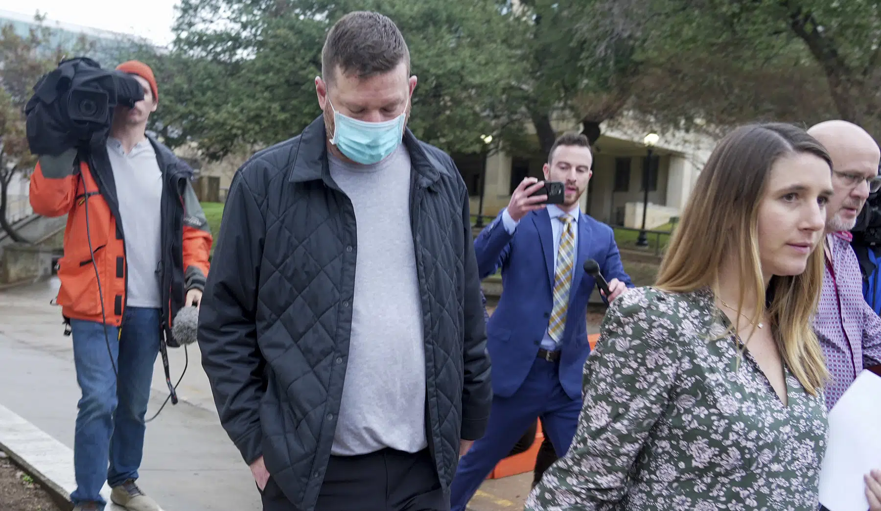 Texas suspends coach Chris Beard over family violence charge | AP News