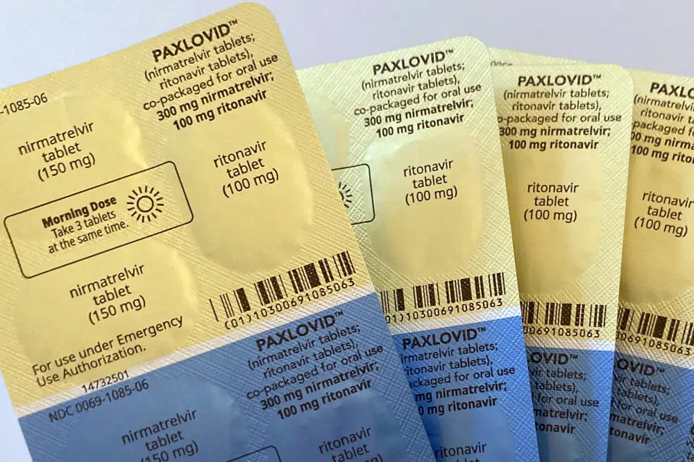 FILE - Doses of the anti-viral drug Paxlovid are displayed in New York, on Monday, Aug. 1, 2022. The COVID-19 medication won another vote of confidence from U.S. health advisors on Thursday, March 16, 2023, clearing the way for its full regulatory approval after being used by millions of Americans under emergency use. (AP Photo/Stephanie Nano, File)