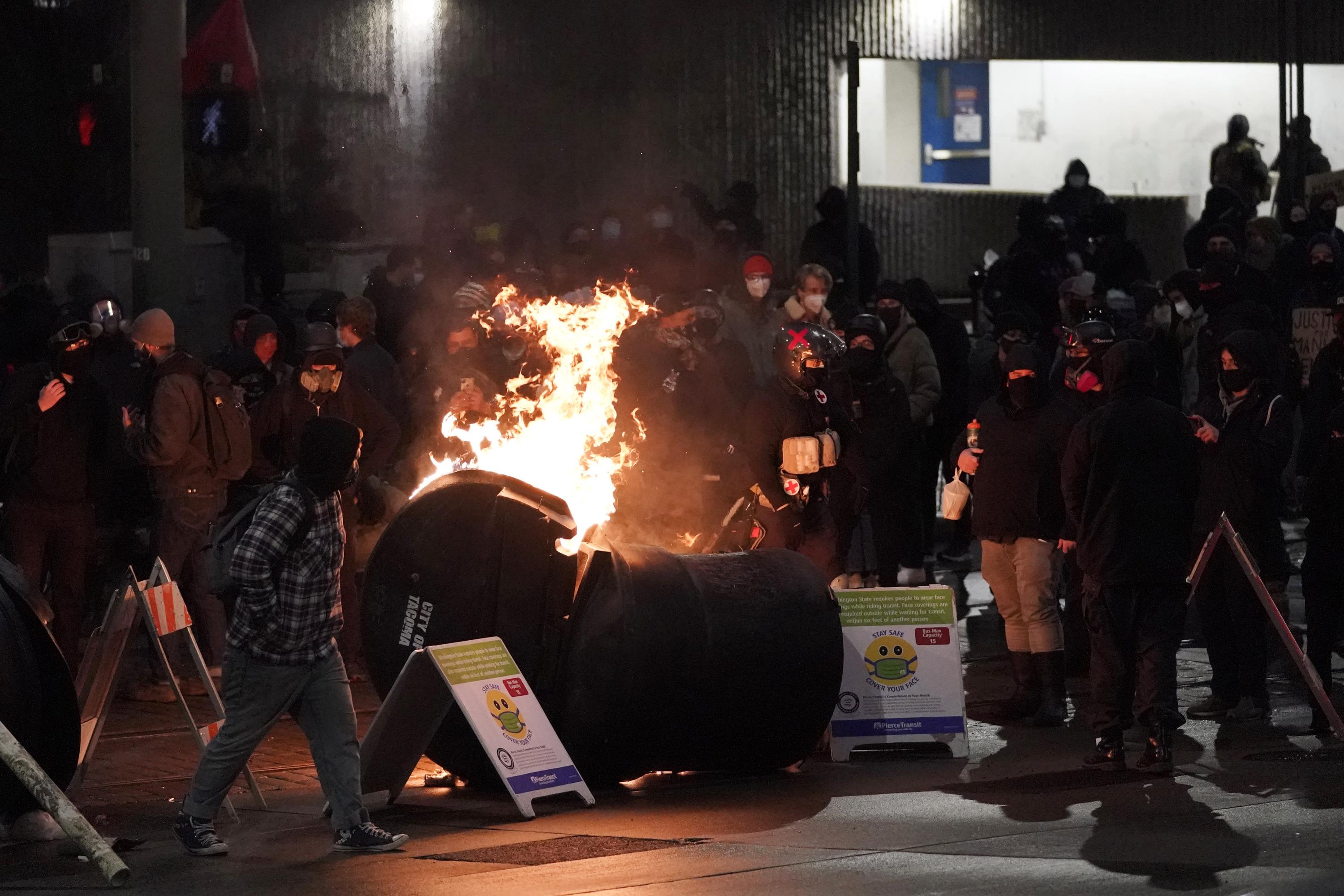 Protest breaks out over police car passing crowd