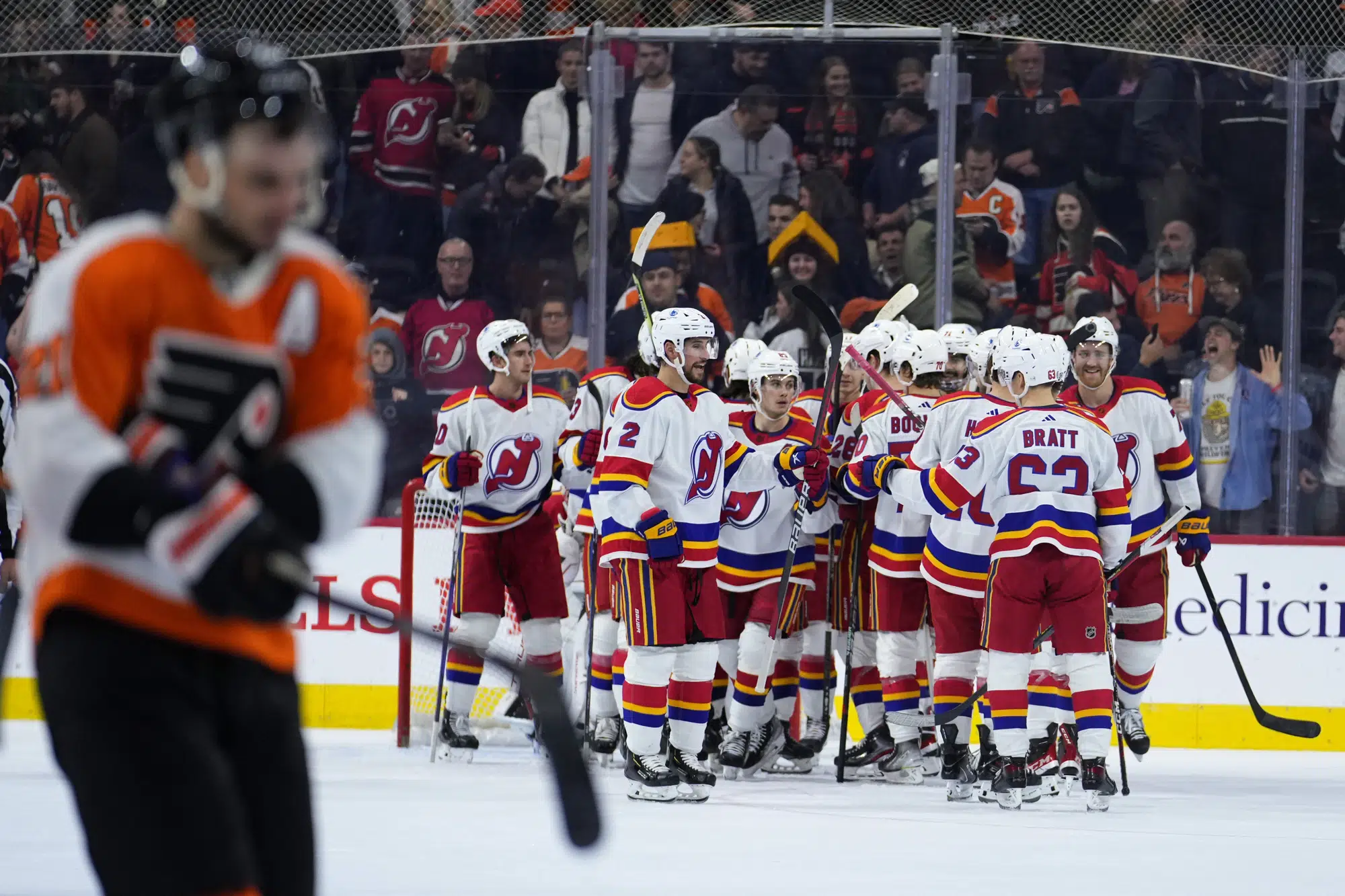 Devils beat Flyers for team-record 11th straight road win | AP News