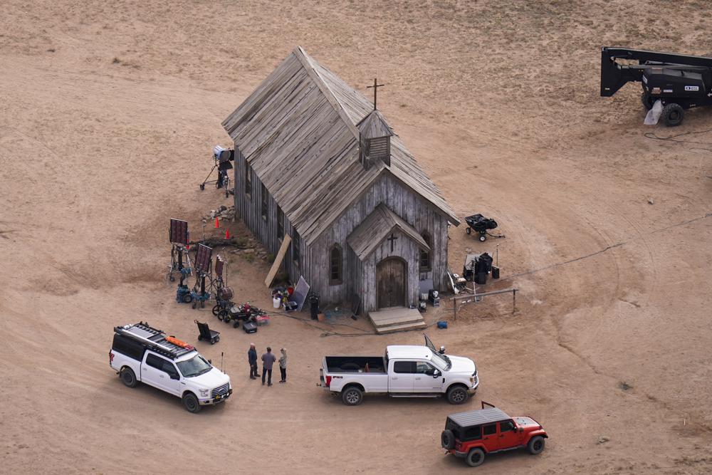 FILE - This aerial photo shows the Bonanza Creek Ranch in Santa Fe, N.M., on Saturday, Oct. 23, 2021. The person in charge of weapons on the movie set at the ranch where actor Alec Baldwin fatally shot cinematographer Halyna Hutchins said Wednesday night, Nov. 3 that she suspects someone put in a live bullet in the prop gun that Baldwin shot. (AP Photo/Jae C. Hong, File)