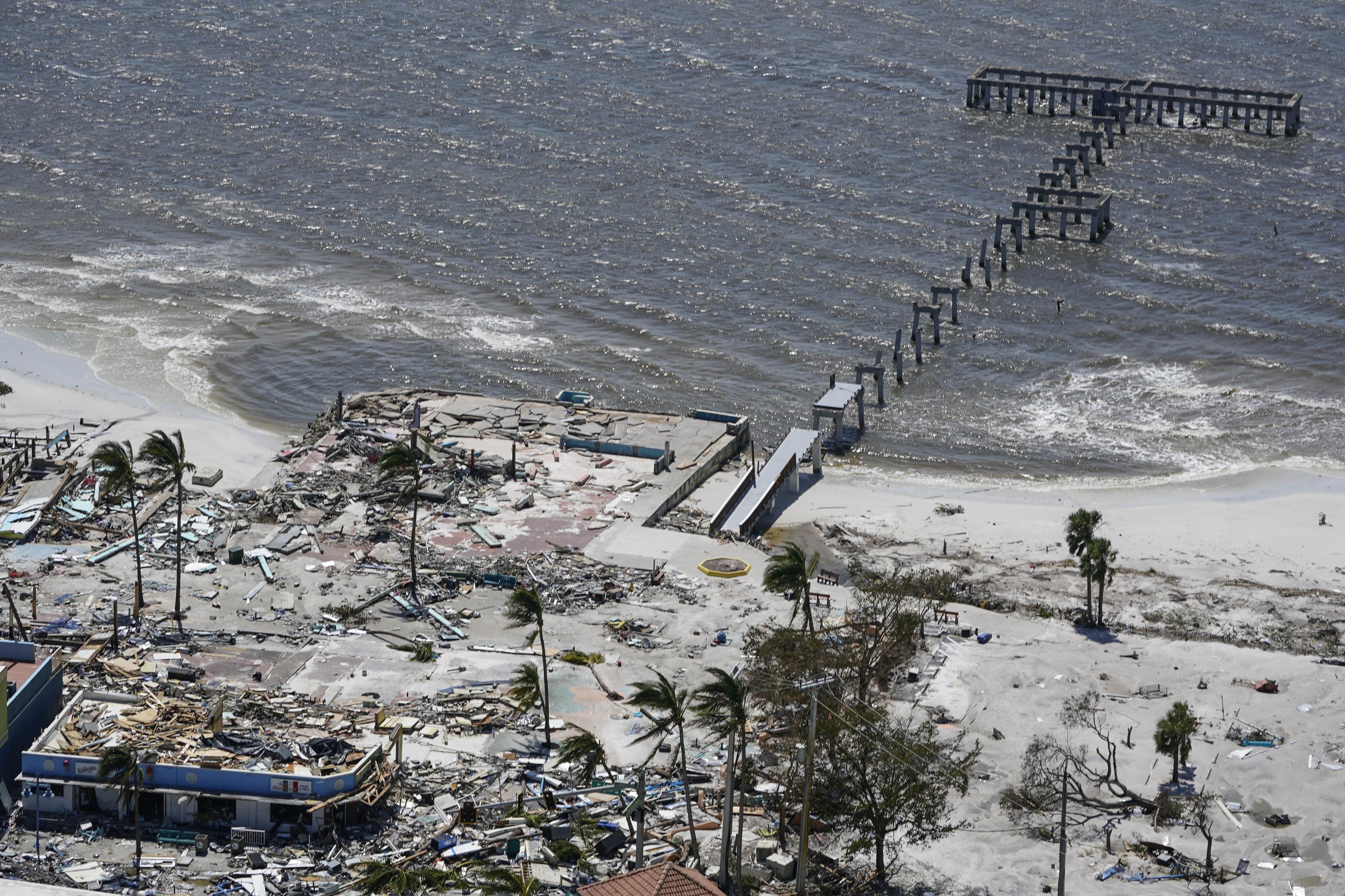 Stormbattered Florida businesses face arduous rebuilding AP News