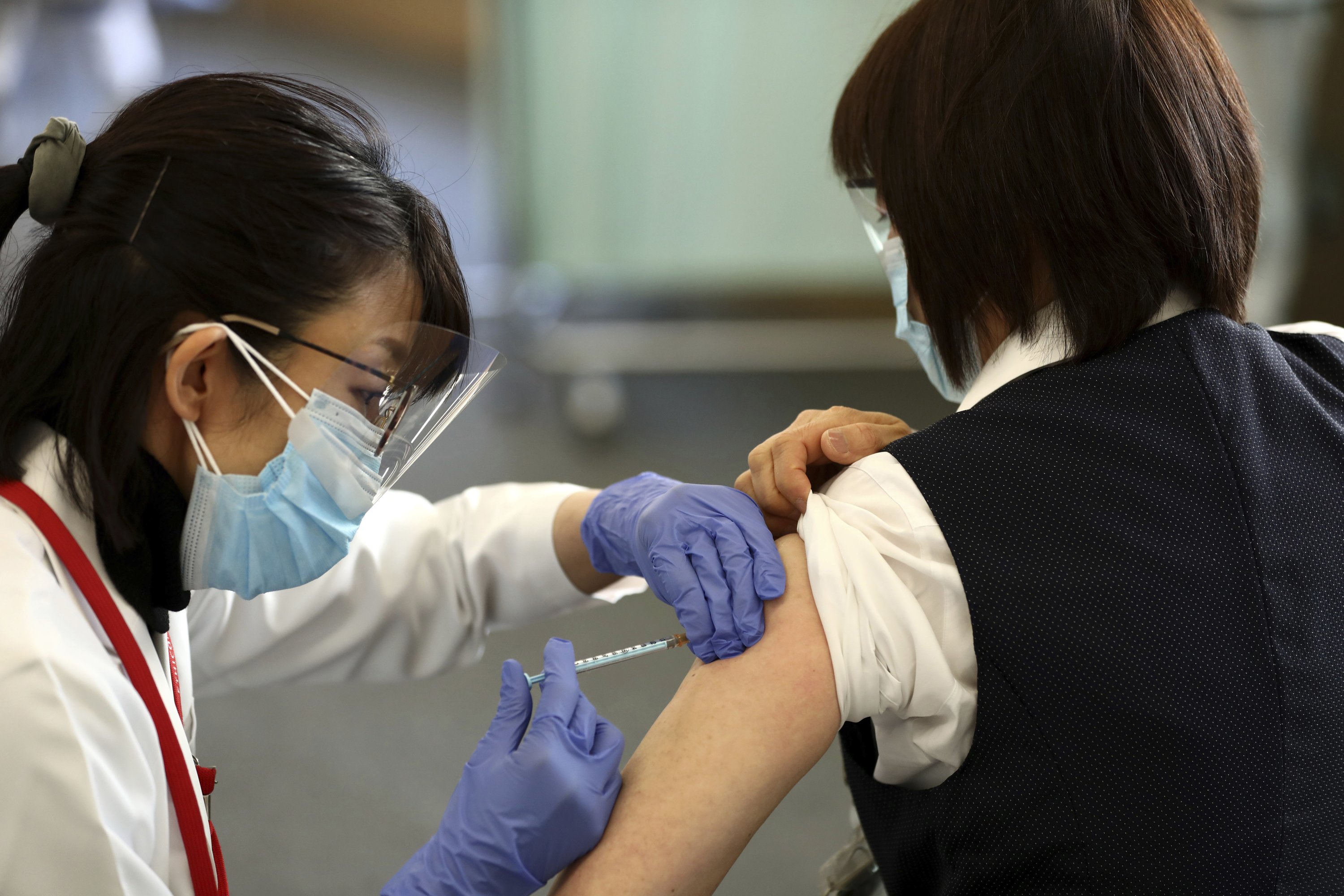 Japan begins COVID-19 vaccinations with an eye on the Olympics