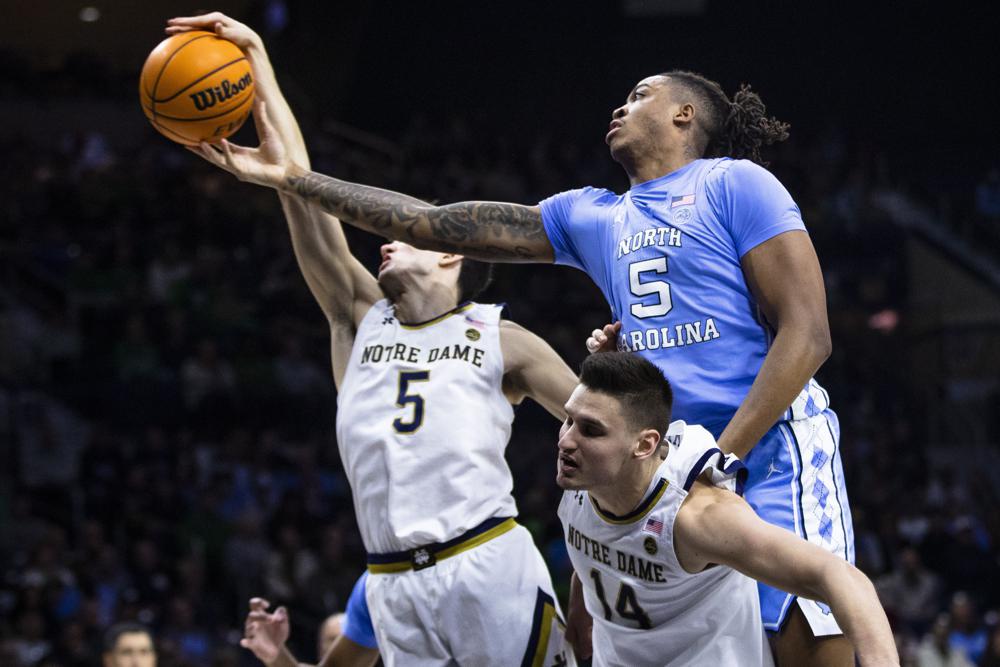 Caleb Love, Armando Bacot lead North Carolina past Notre Dame 63-59