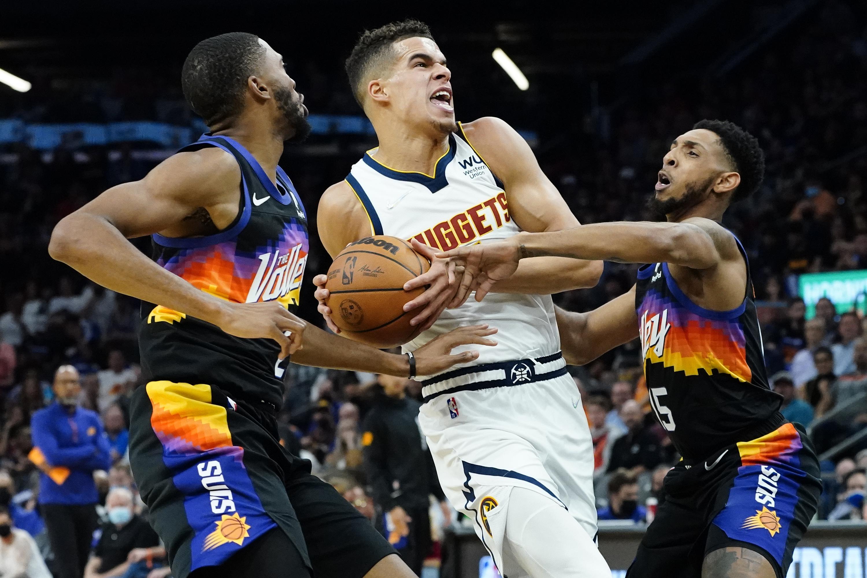 Jokic scores 27 points, Nuggets beat Suns 11098 AP News