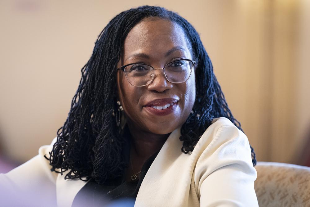 Supreme Court nominee Ketanji Brown Jackson meets with Sen. Patrick Leahy, D-Vt., the senior member of the Judiciary Committee, at the Capitol in Washington, Thursday, March 3, 2022. Judge Jackson's confirmation hearing starts March 21. If confirmed, she would be the court's first Black female justice. (AP Photo/J. Scott Applewhite)