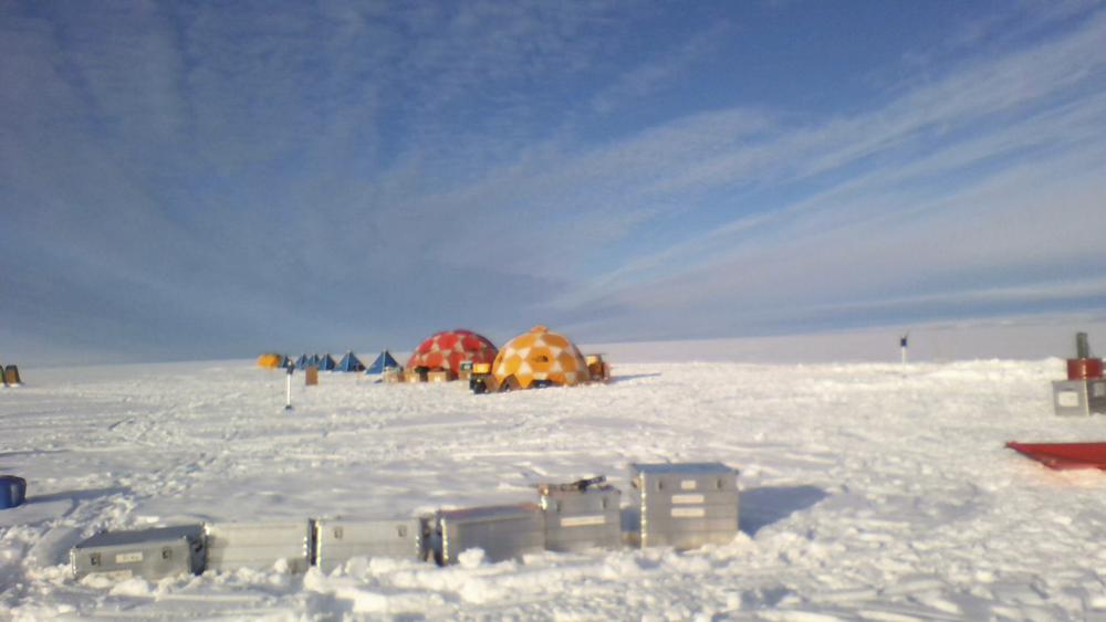 This photo provided by environmental scientist David Holland shows tents set up on the Dotson Ice Shelf in Antarctica on Monday, Jan. 31, 2022. A large iceberg broke off the deteriorating Thwaites glacier and along with sea ice it is blocking two research ships with dozens of scientists from examining how fast its crucial ice shelf is falling apart. The smaller Dotson ice shelf is about 87 miles (140 kilometers) west of the Thwaites ice shelf. (David Holland via AP)