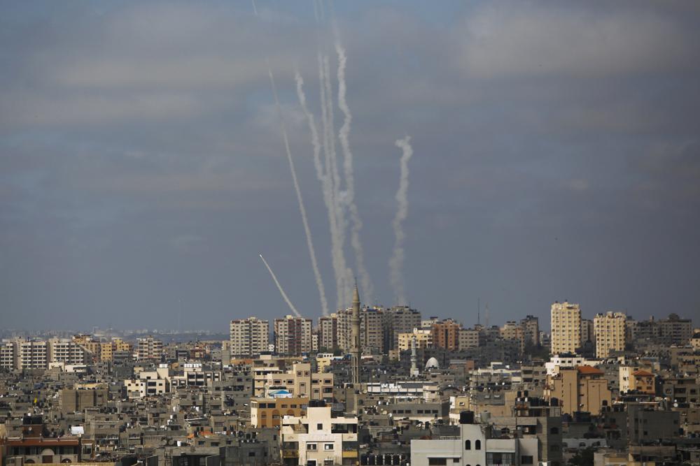 Rockets are launched from the Gaza Strip towards Israel, in Gaza City, Thursday, May 20, 2021. (AP Photo/Hatem Moussa)