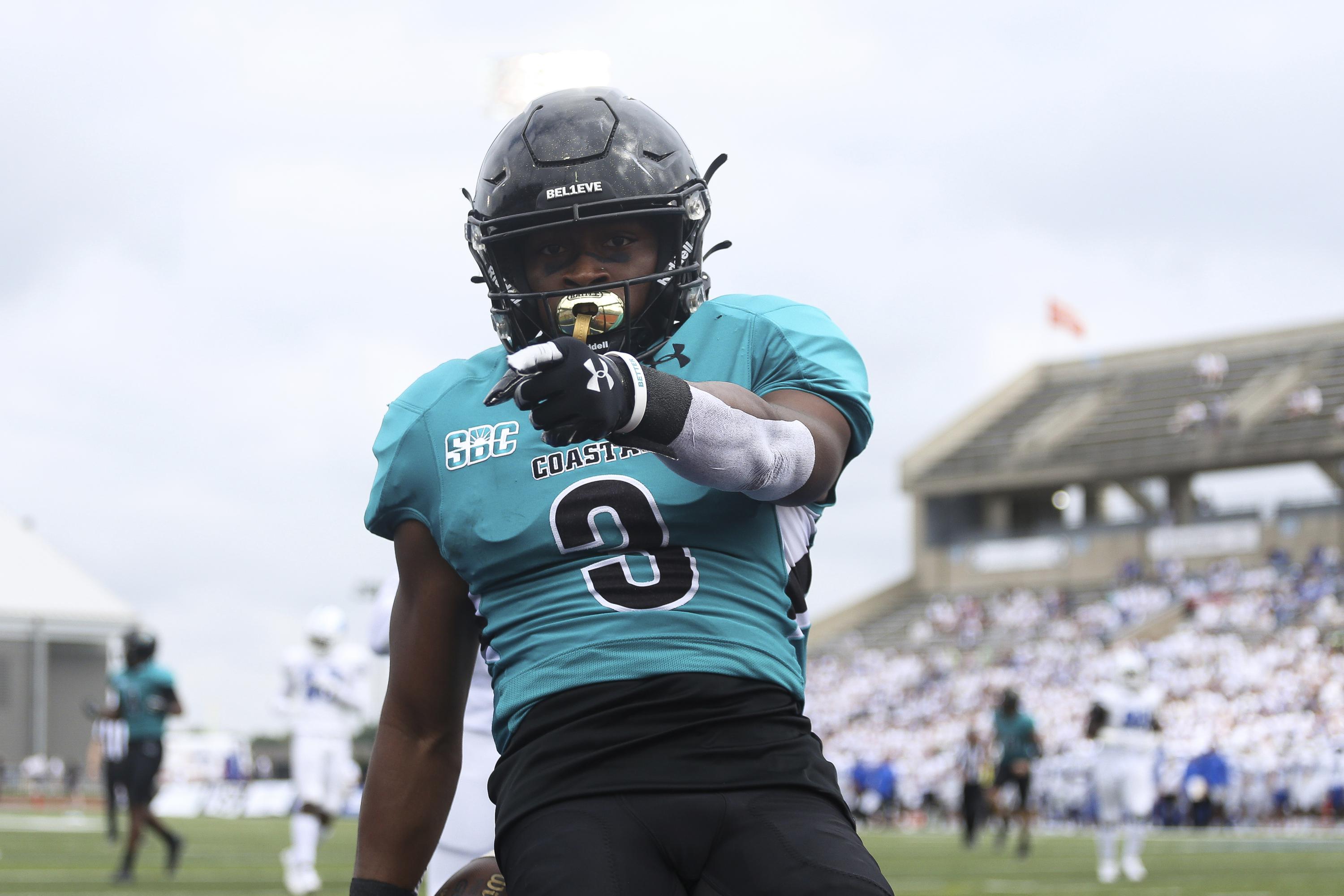 No. 16 Coastal Carolina holds on to beat Buffalo 2825 AP News