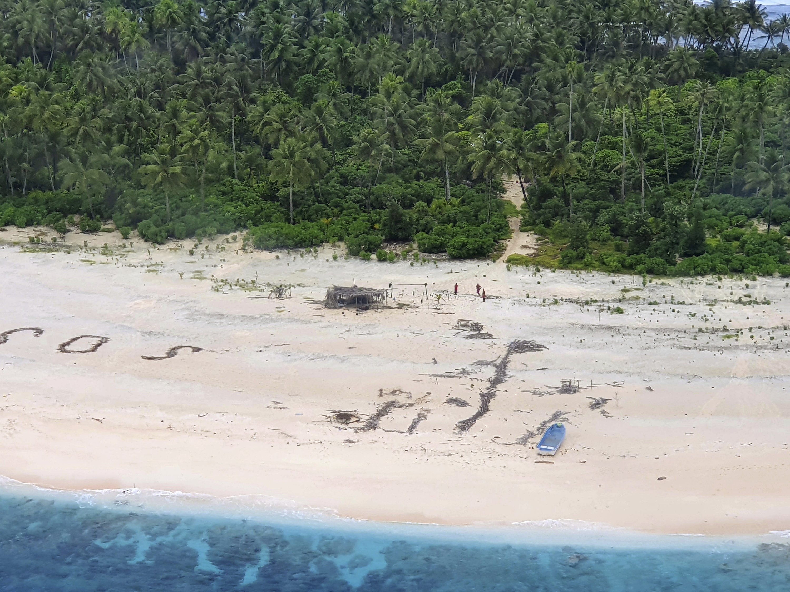 3 Men Rescued From Pacific Island After Writing Sos In Sand Ap News 