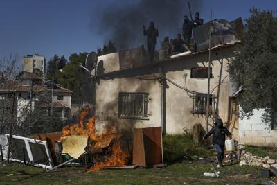Una casa de palestinos en el vecindario Sheikh Jarrah de Jerusalén oriental el 17 de enero del 2022.  (Foto AP/Mahmoud Illean)