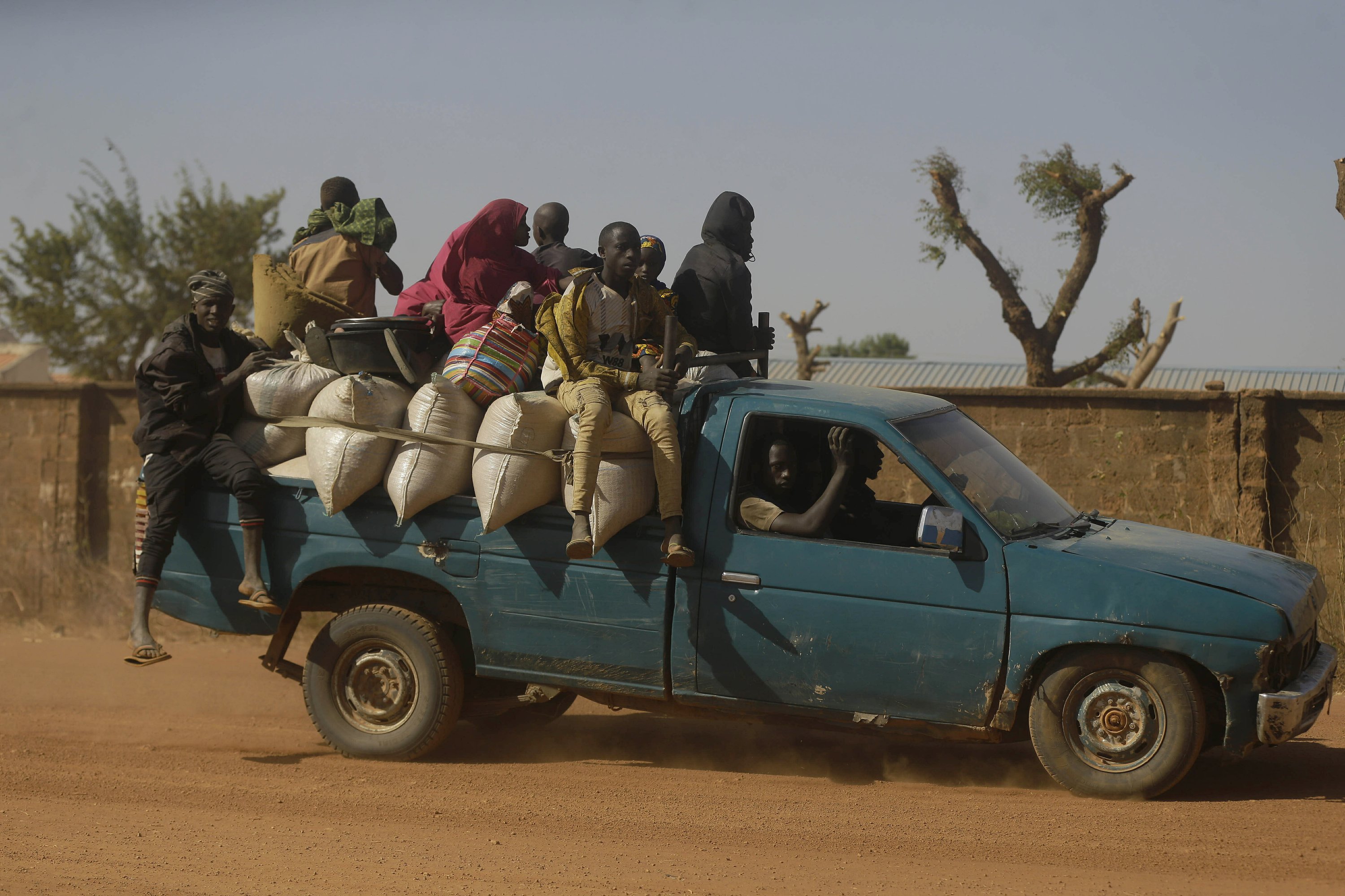 Anxious Nigerians after 330 boys kidnapped by extremists