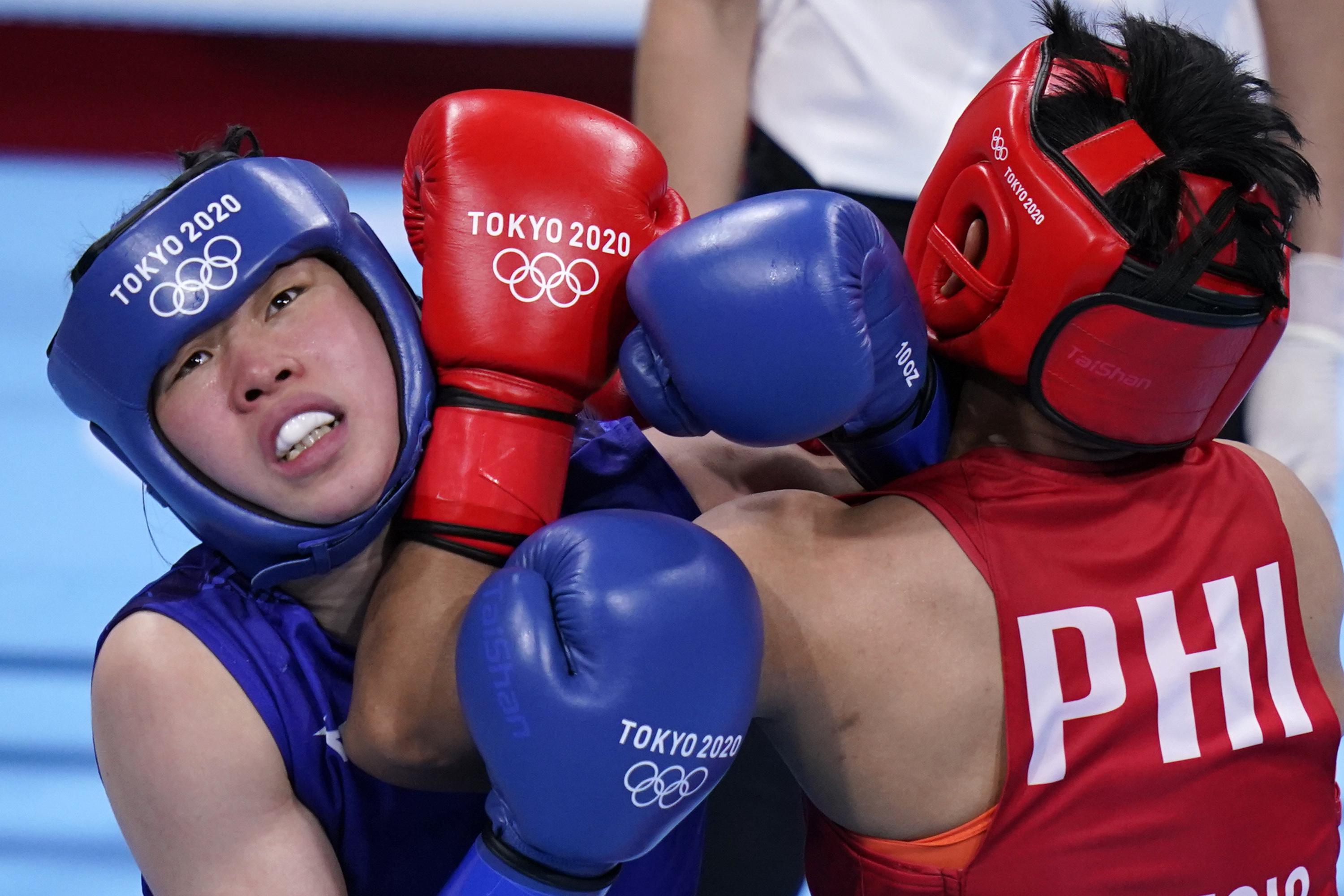 Olympics Latest: Japan's Sena Irie wins featherweight boxing