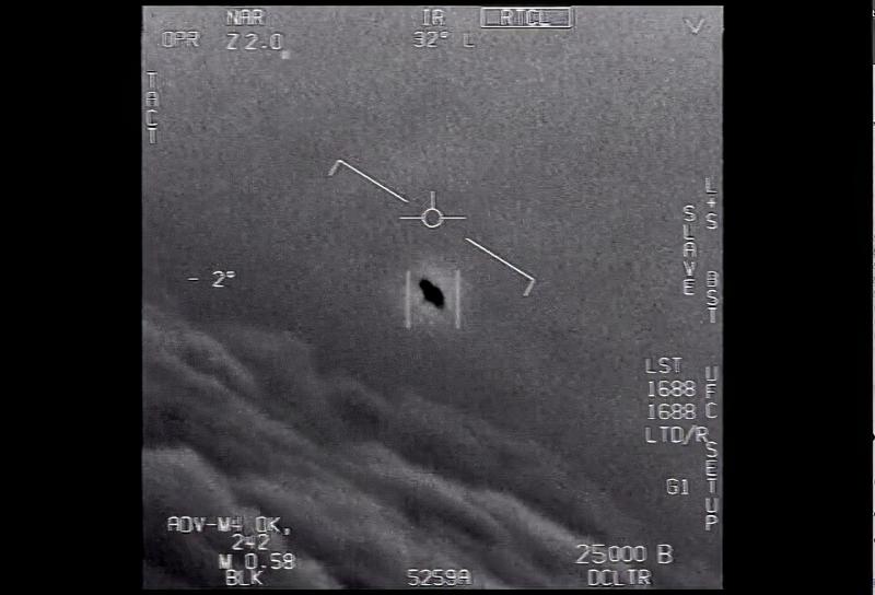 The image from video provided by the Department of Defense labelled Gimbal, from 2015, an unexplained object is seen at center as it is tracked as it soars high along the clouds, traveling against the wind. “There's a whole fleet of them,” one naval aviator tells another, though only one indistinct object is shown. “It's rotating. The U.S. government has been taking a hard look at unidentified flying objects, under orders from Congress, and a report summarizing what officials know is expected to come out in June 2021. (Department of Defense via AP)
