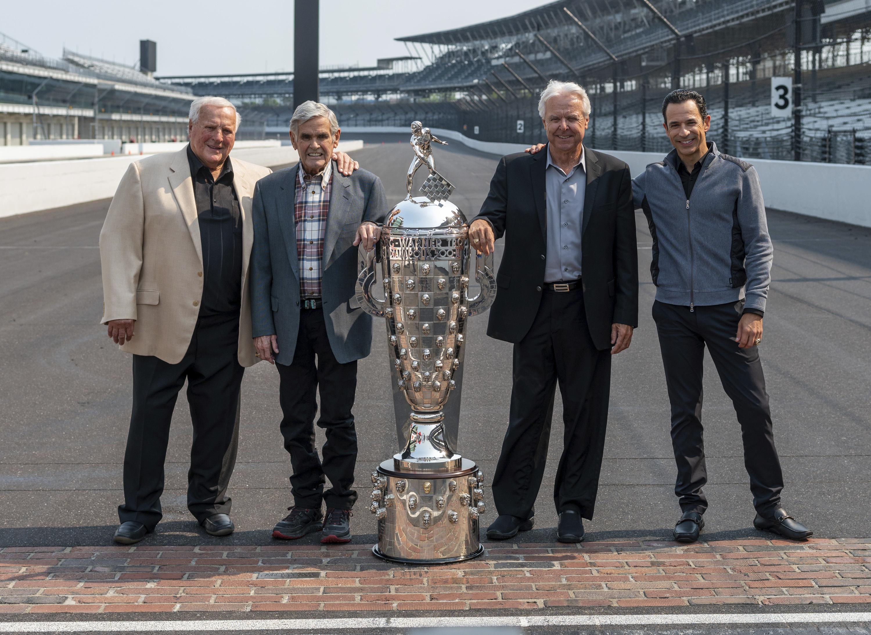 Castroneves happily joins elite club of 4-time Indy winners | AP News