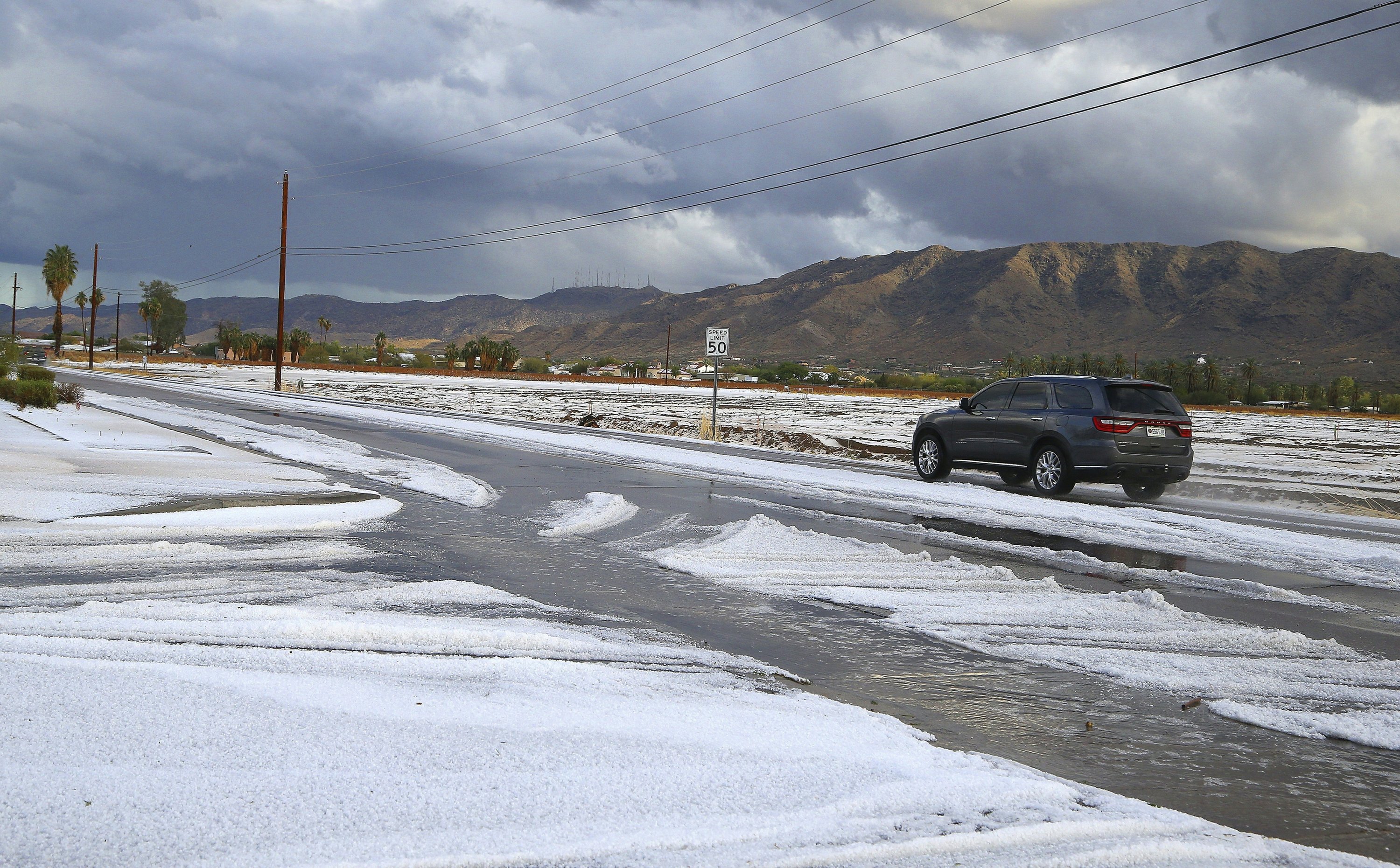 Snowlike hail in Phoenixarea desert caps days of storms AP News