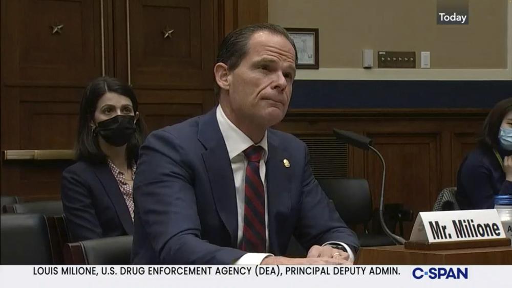 In this image from video provided by C-SPAN, Louis Milione, the U.S. Drug Enforcement Administration’s deputy administrator, speaks during a hearing held by the House Energy and Commerce Subcommittee on Health in Washington on Dec. 2, 2021. After temporarily leaving the DEA in 2017, like dozens of colleagues in the agency's powerful-but-little-known Office of Diversion Control, he immediately went to work as a consultant for some of the same companies he had been tasked with regulating, including Morris & Dickson. He was named deputy administrator in 2021. (C-SPAN via AP)