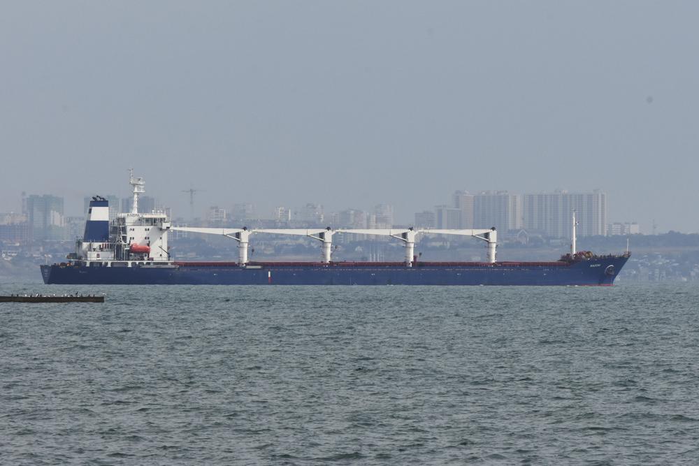 The bulk carrier Razoni starts its way from the port in Odesa, Ukraine, Monday, Aug. 1, 2022. According to Ukraine's Ministry of Infrastructure, the ship under Sierra Leone's flag is carrying 26 thousand tons of Ukrainian corn to Lebanon. The first ship carrying Ukrainian grain set off from the port of Odesa on Monday under an internationally brokered deal and is expected to reach Istanbul on Tuesday, where it will be inspected, before being allowed to proceed. (AP Photo/Michael Shtekel)