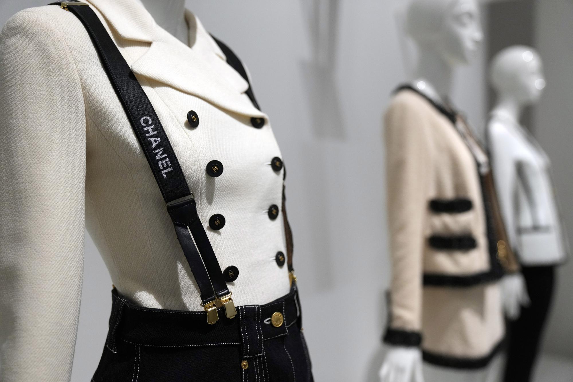 Designs by Karl Lagerfeld are displayed at the Metropolitan Museum of Art's Costume Institute exhibition, "Karl Lagerfeld: A Line of Beauty," on Saturday, April 29, 2023, in New York. (Photo by Charles Sykes/Invision/AP)