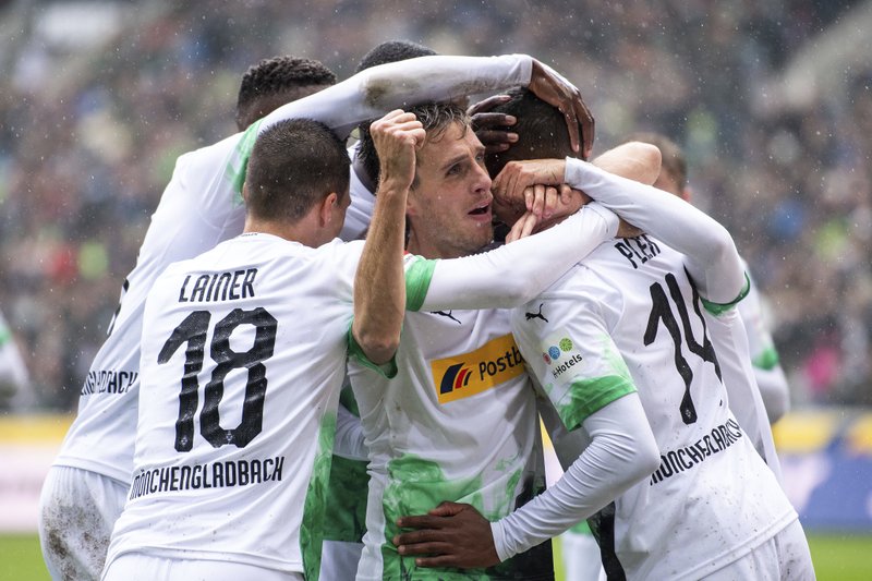 Gladbach routs Augsburg 5-1, moves top of the Bundesliga