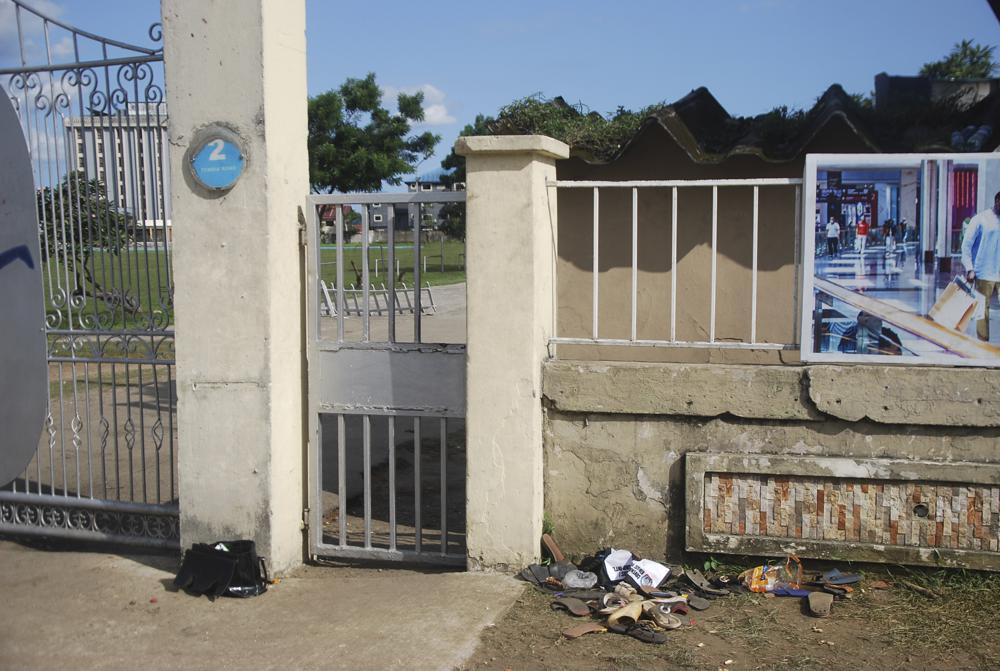 A view of sandles outside Kings Assembly Pentecostal church, following a stampede in Port Harcourt, Nigeria, Saturday, May 28, 2022. Police say a stampede at a church charity event in southern Nigeria has left at least 31 people dead and seven injured. One witness said the dead included a pregnant woman and “many children.” Police said the stampede took place at an annual “Shop for Free” program organized by the Kings Assembly Pentecostal church in Rivers state. Such events are common in Nigeria, (AP Photo)