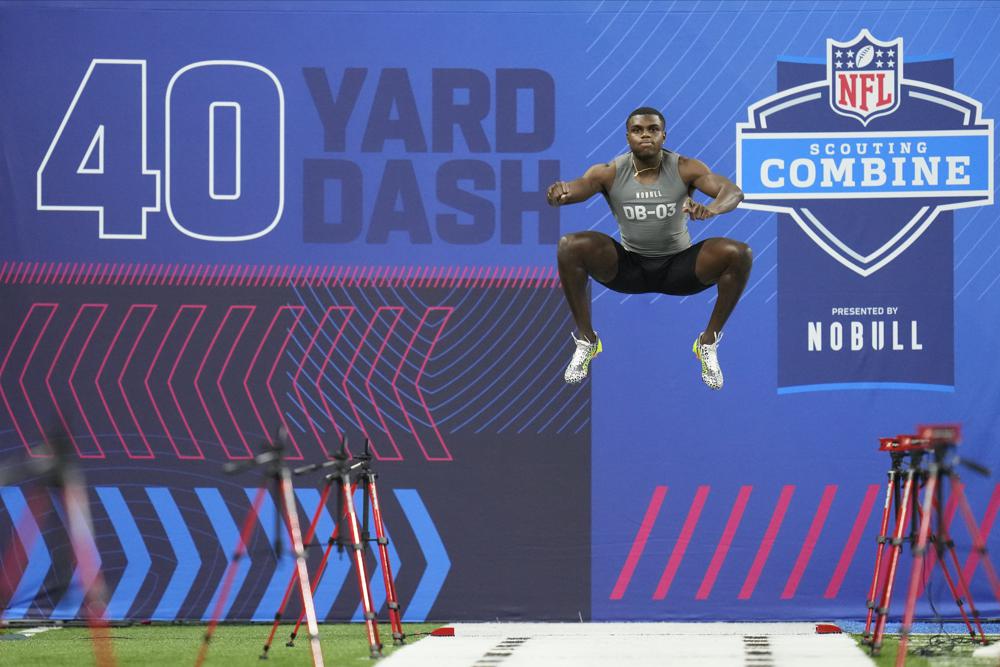 Maryland defensive back Ja'Korian Bennett runs the 40-yard dash at the NFL football scouting combine in Indianapolis, Friday, March 3, 2023. (AP Photo/Michael Conroy)