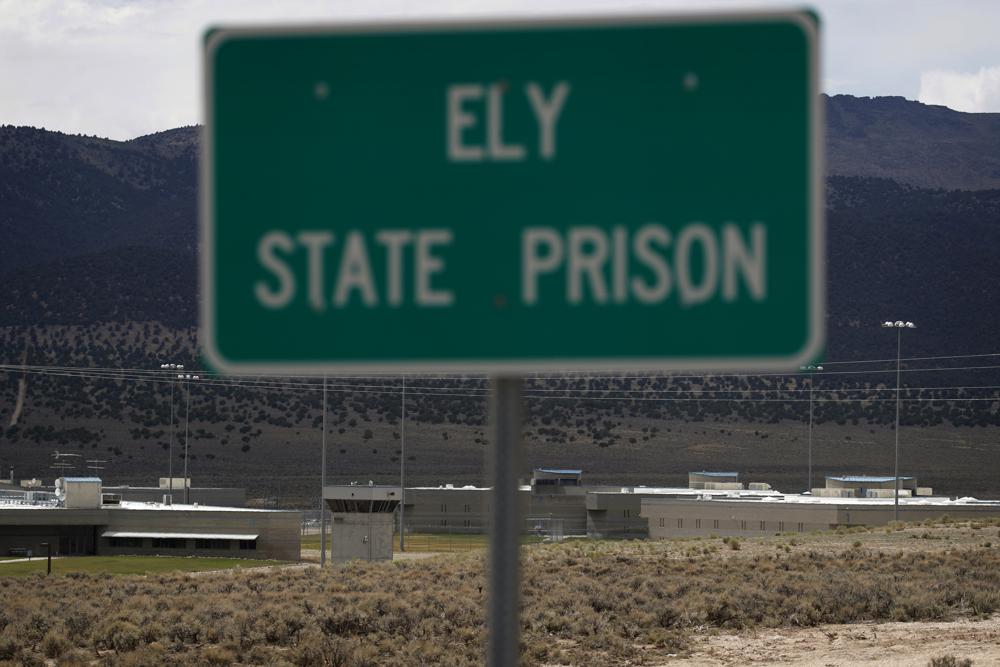FILE - In this July 11, 2018, file photo, a sign marks the entrance to Ely State Prison, the location of Nevada's execution chamber near Ely, Nev. Two years after banning a practice known as prison gerrymandering, Nevada will count almost half of its prison population in districts where they're incarcerated, rather than at their previous addresses. (AP Photo/John Locher, File)