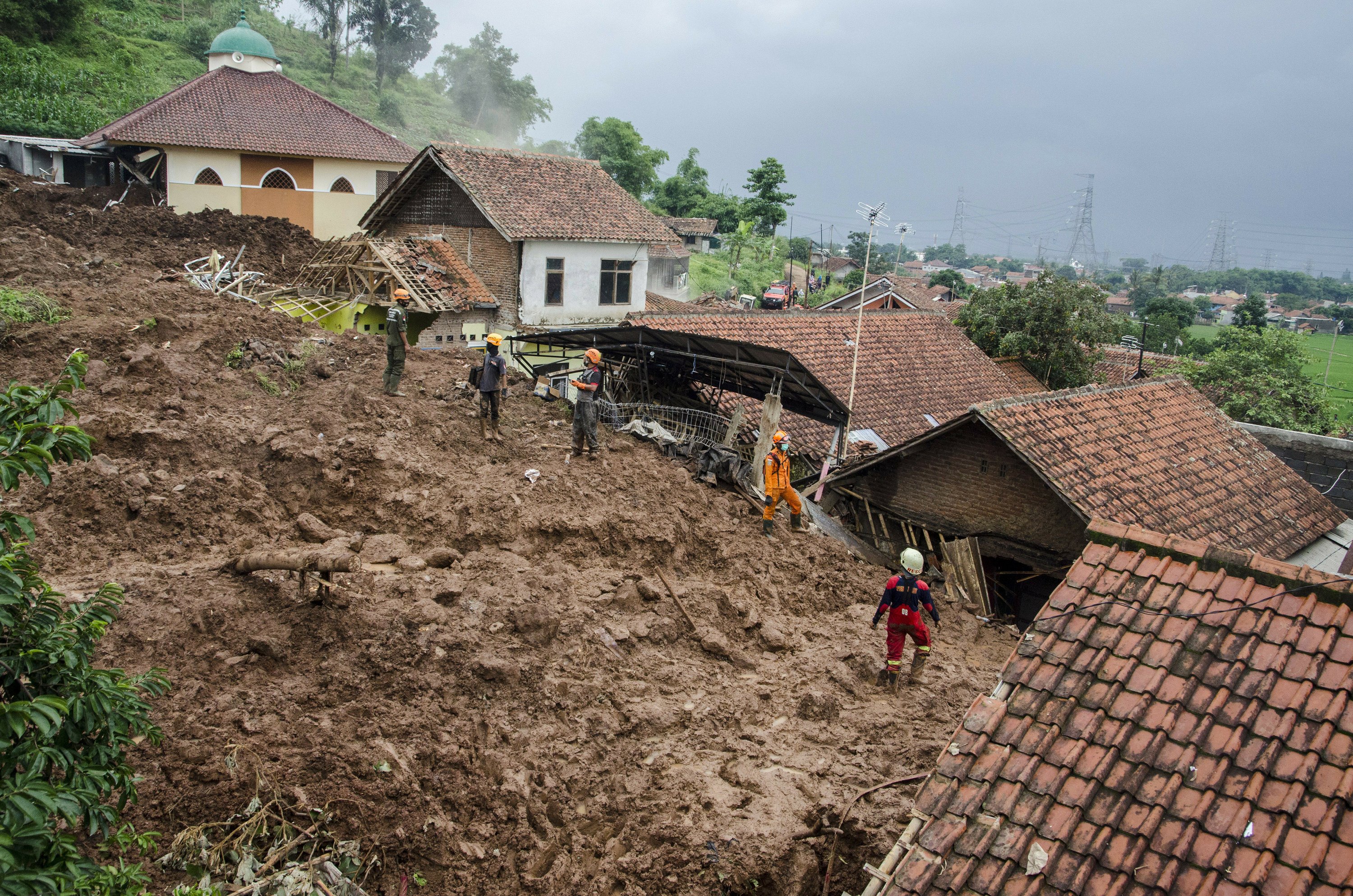 26 missing, at least 13 dead in Indonesian landslides