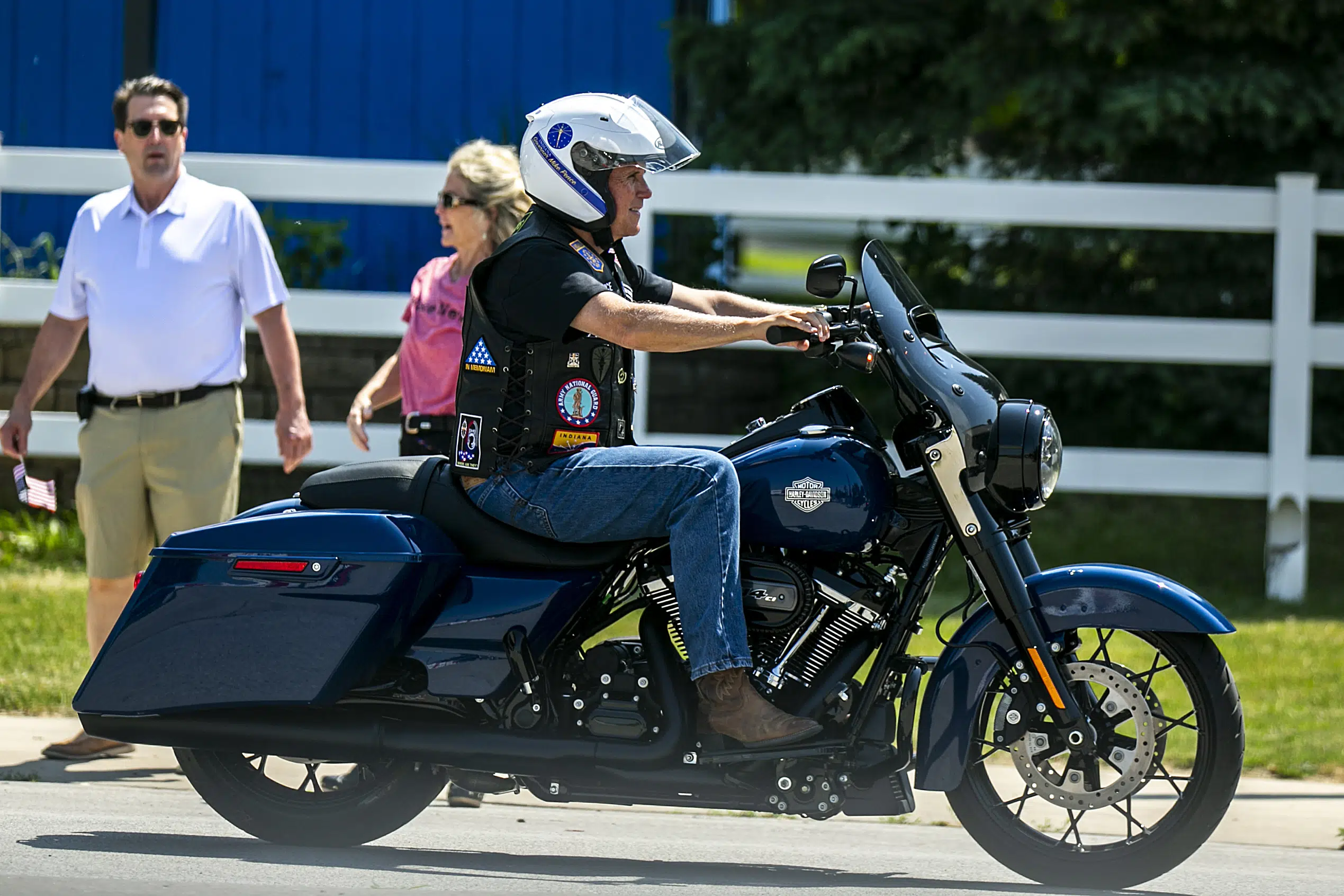 DeSantis signs Bible, Pence hops on motorcycle at 'Roast and Ride