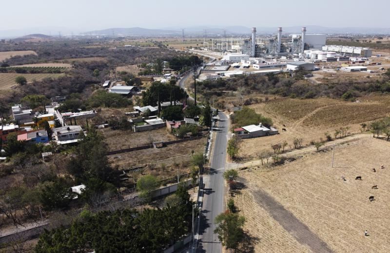 FILE - In this Feb. 22, 2020 file photo, a power generation plant stands idle near Huexca, Morelos state, Mexico. A constitutional reform presented by President Andrés Manuel López Obrador would cancel contracts under which some private power generating plants plants sell power into the national grid, declares “illegal” other private plants that sell energy direct to corporate clients in Mexico and would cancel many long-term energy supply contracts and clean-energy preferential buying schemes. (AP Photo/Eduardo Verdugo, File)