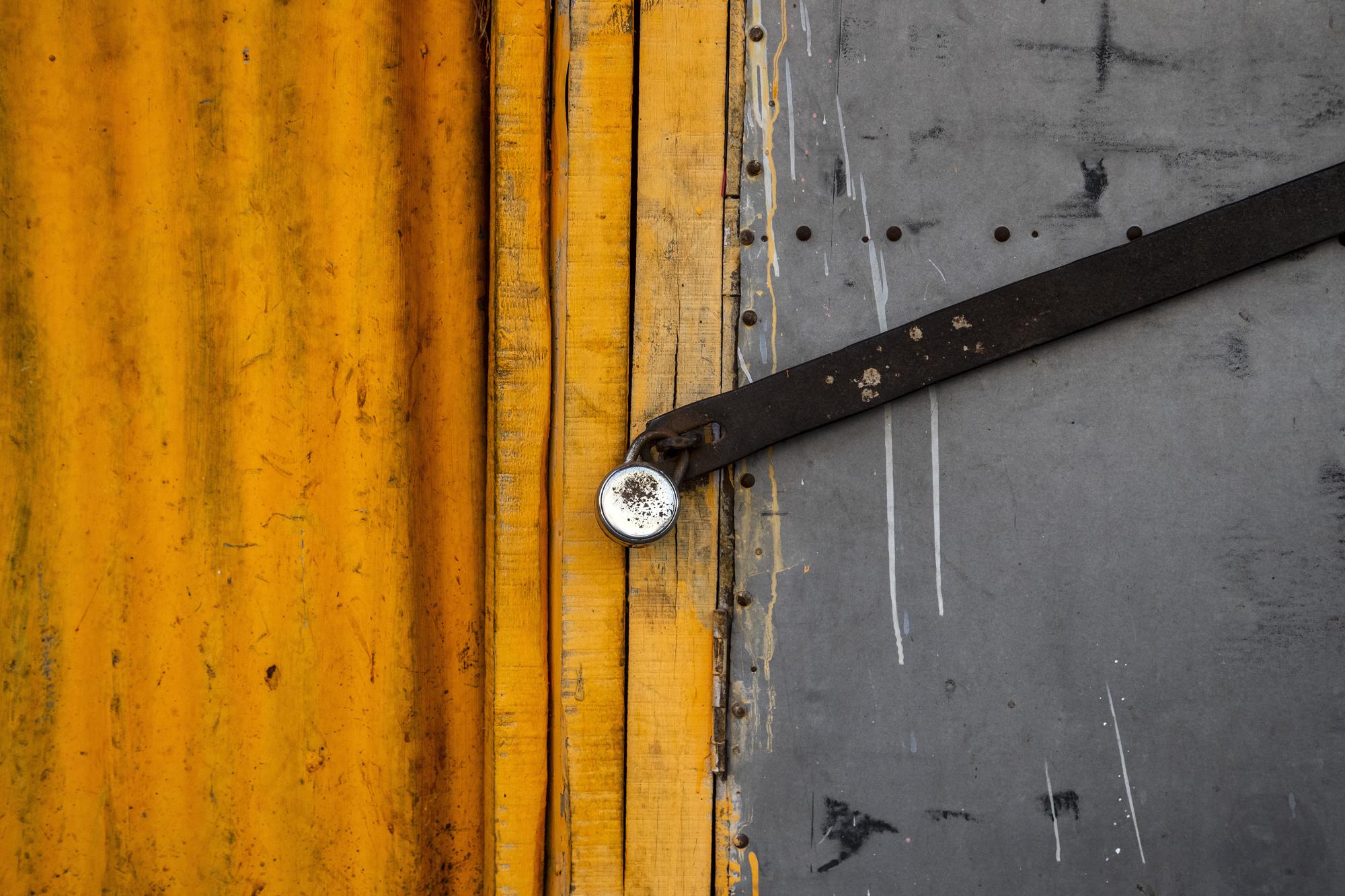 A shop is seen locked at a market area in Gauhati, India on June 18, 2021. Rows of locked shops confront bargain-hunters for most of the day in Fancy Bazar, a nearly 200-year-old market that offered cheap prices until the COVID-19 pandemic hit Gauhati, the biggest city in India’s remote northeast. (AP Photo/Anupam Nath)