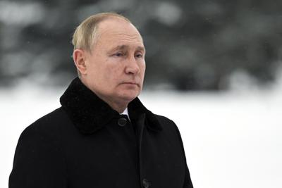 FILE Russian President Vladimir Putin attends a wreath laying commemoration ceremony at the Piskaryovskoye Cemetery where most of the Leningrad Siege victims were buried during World War II, in St.Petersburg, Russia, Thursday, Jan. 27, 2022. All eyes are now on President Vladimir Putin, who will decide how Russia will respond amid fears that Europe could again be plunged into war. (Alexei Nikolsky, Sputnik, Kremlin Pool Photo via AP, File)