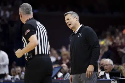 Clark's record night lifts No. 10 Virginia past Hokies 78-68 | AP News