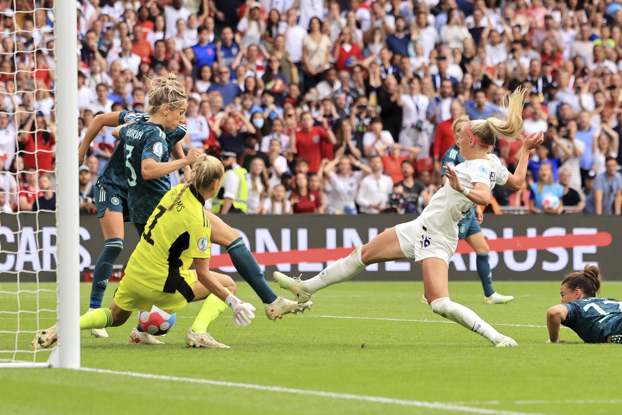 FILE - England's Chloe Kelly scores her side's second goal during the Women's Euro 2022 final soccer match between England and Germany at Wembley stadium in London, Sunday, July 31, 2022. (AP Photo/Leila Coker, File)