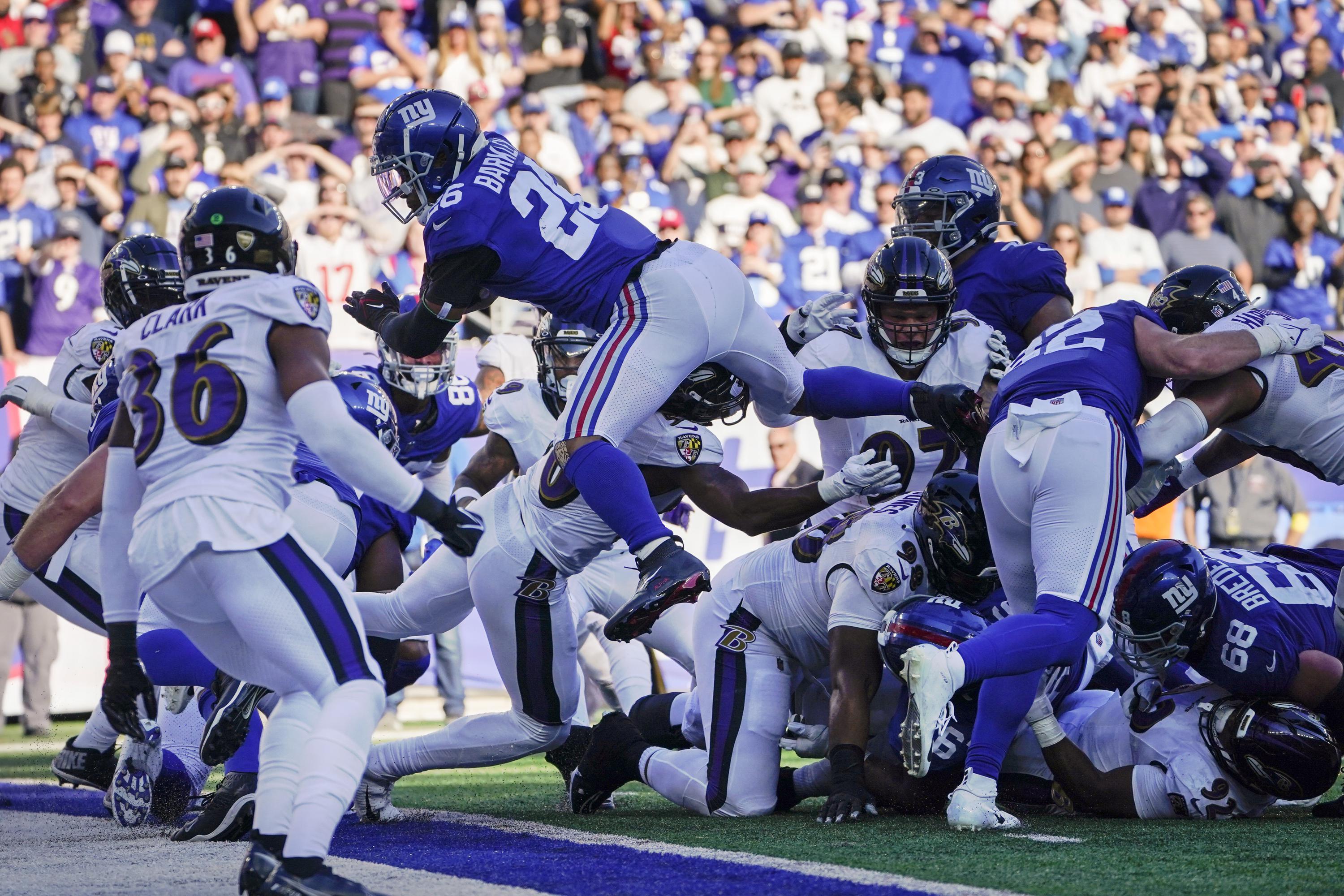 Giants rally from 10 down, top Ravens 2420 on Barkley's run AP News
