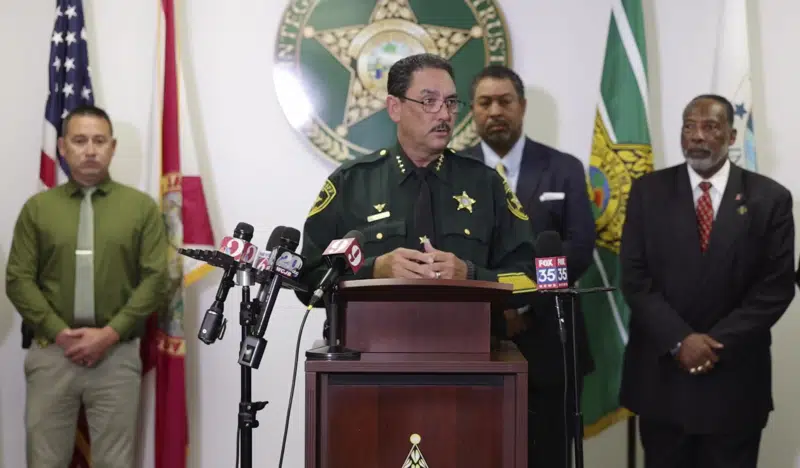 In this frame grab from video broadcast by the Marion County Sheriff's Office, Sheriff Billy Woods speaks at a news conference, in Ocala, Fla., Monday, June 5, 2023. Officials say a neighborhood feud over playing children has ended in a Florida mother’s fatal shooting. (Courtesy of Marion County Sheriff's Office via AP)