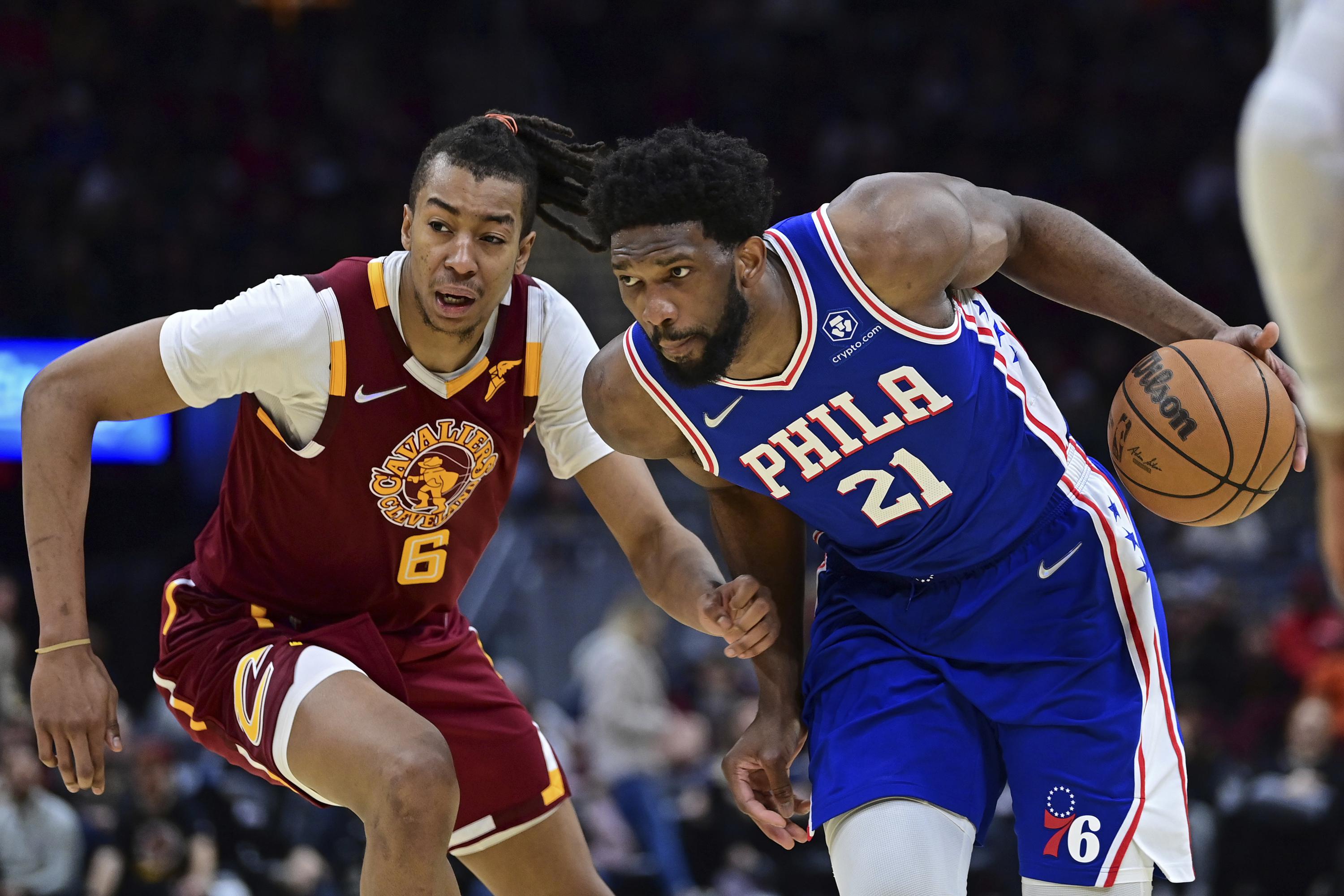 76ers clinch playoff spot with 112108 win over Cavaliers AP News