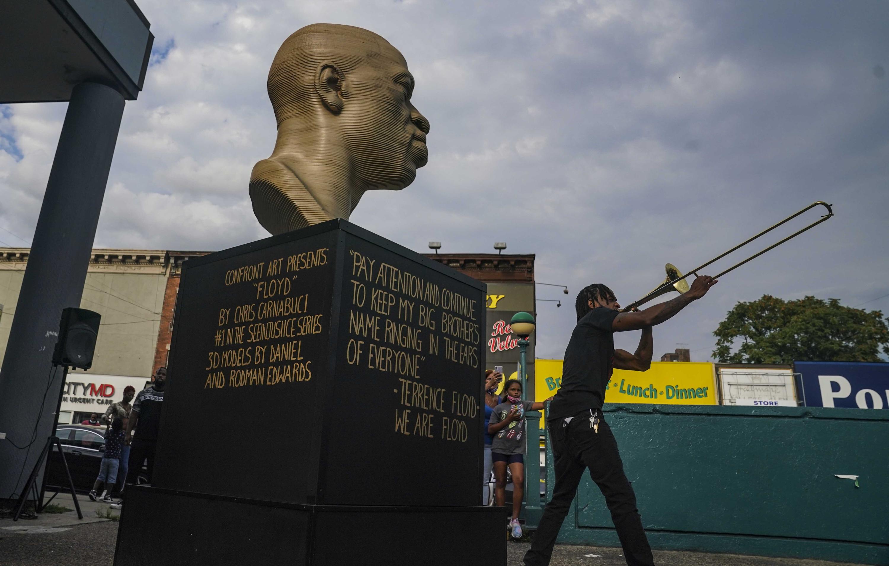 After vandalism, NYC Floyd statue cleaned, will move AP News