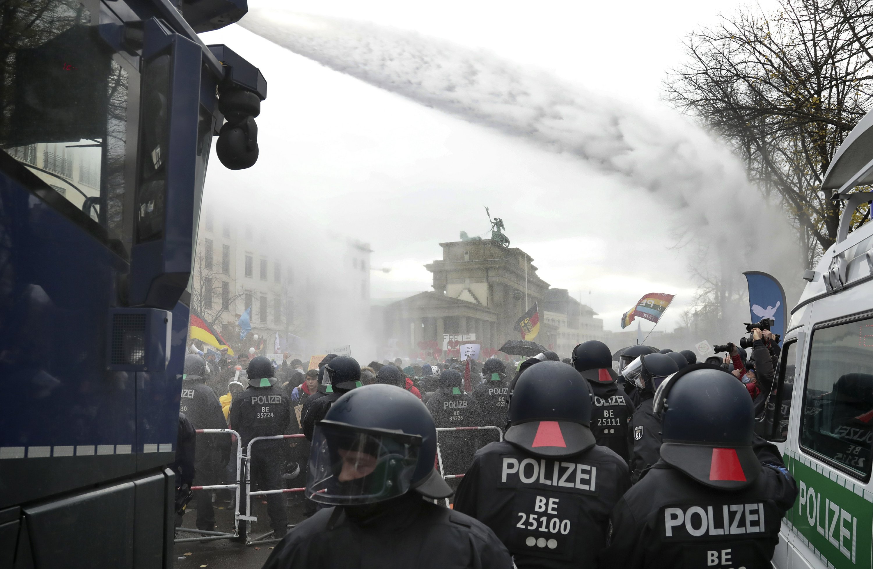 Berlin police forcefully disperse protest over rules... thumbnail