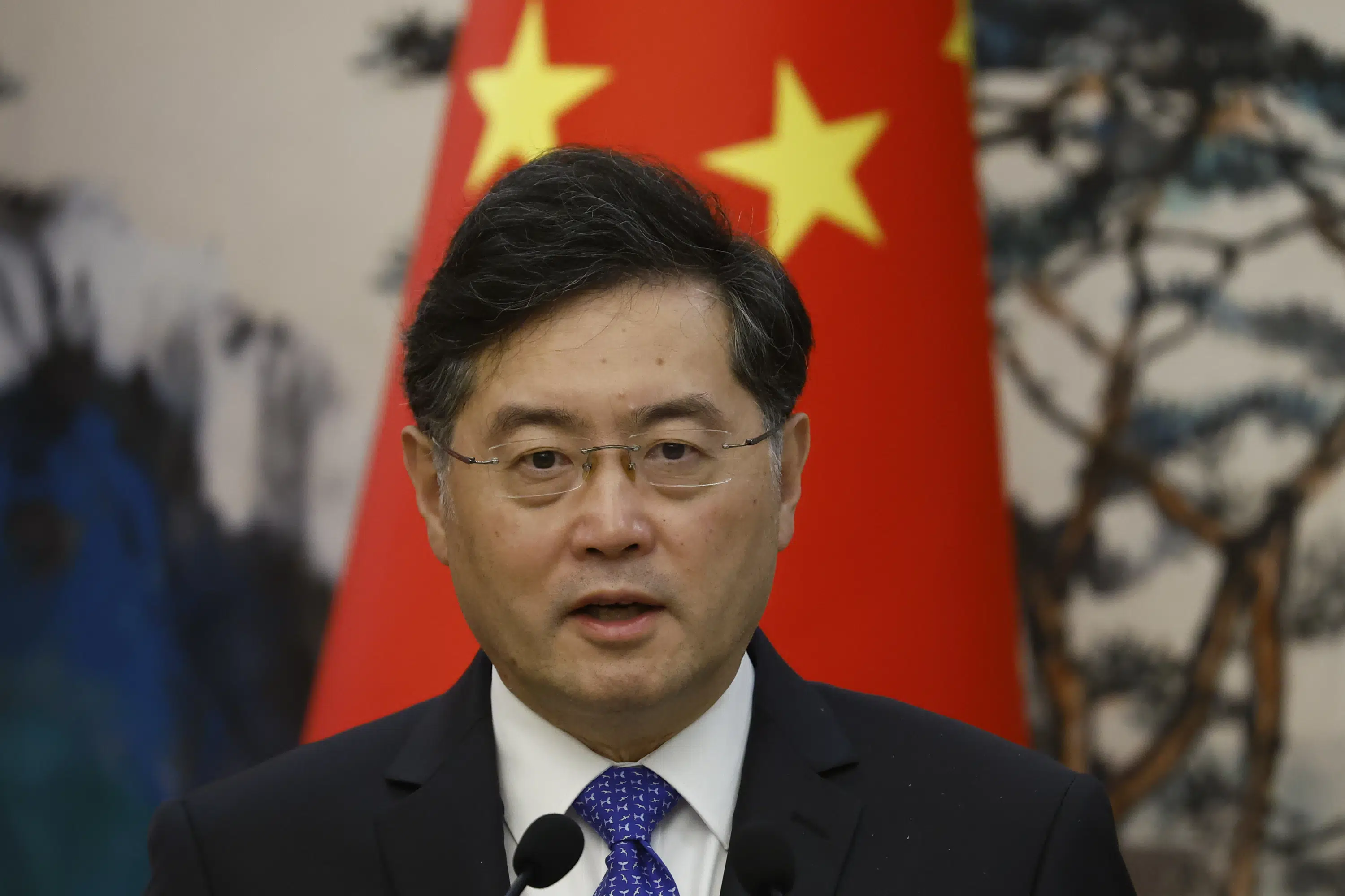 BEIJING (AP) — China’s foreign minister pressed his Dutch counterpart Tuesday for access to advanced chipmaking technology that has been blocked o