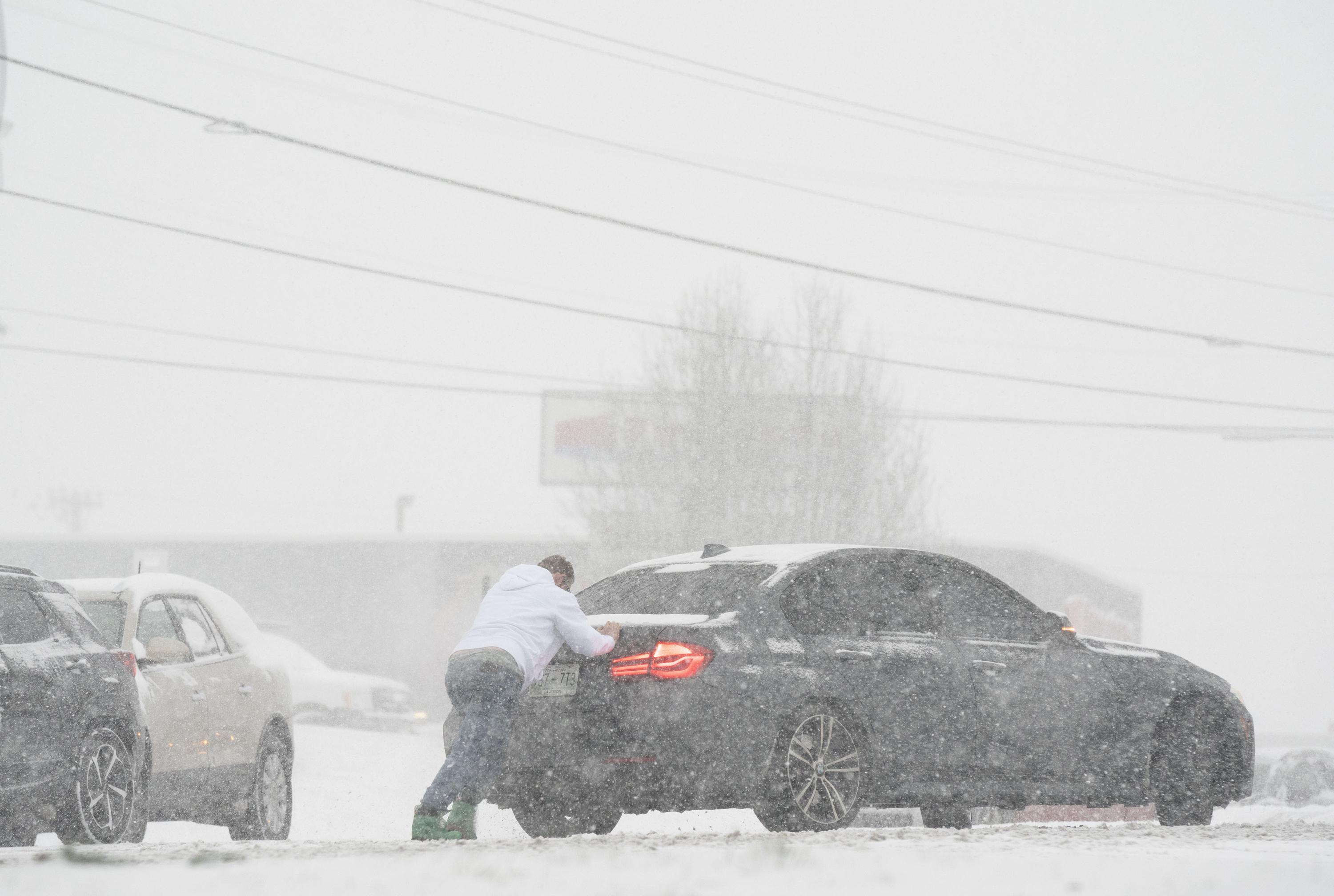 Winter storm blanketing parts of South with snow, ice AP News