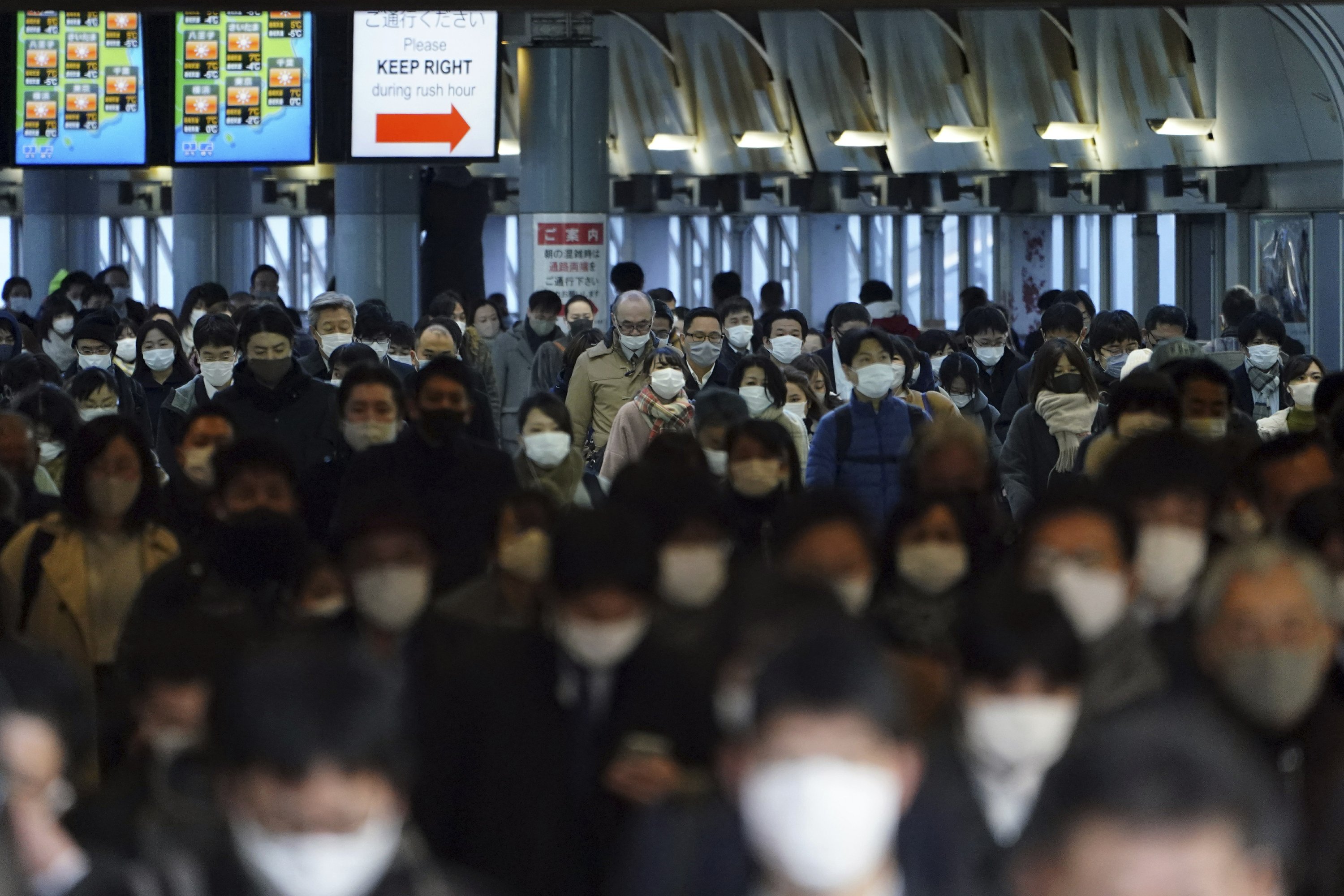 Japan begins first day with emergency measures to contain viruses