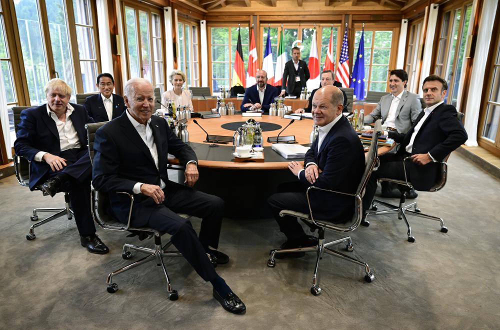 Clockwise from left, British Prime Minister Boris Johnson,  Japanese Prime Minister Fumio Kishida, the President of the European Commission Ursula von der Leyen, European Council President Charles Michel, Italian Prime Minister Mario Draghi, Canadian Prime Minister Justin Trudeau, French President Emmanuel Macron, German Chancellor Olaf Scholz and U.S. President Joe Biden attend a working session during of the G7 leaders summit at Castle Elmau in Kruen, near Garmisch-Partenkirchen, Germany, on Tuesday, June 28, 2022. The Group of Seven leading economic powers are meeting in Germany for their annual gathering Sunday through Tuesday. (John MacDougall/Pool Photo via AP)